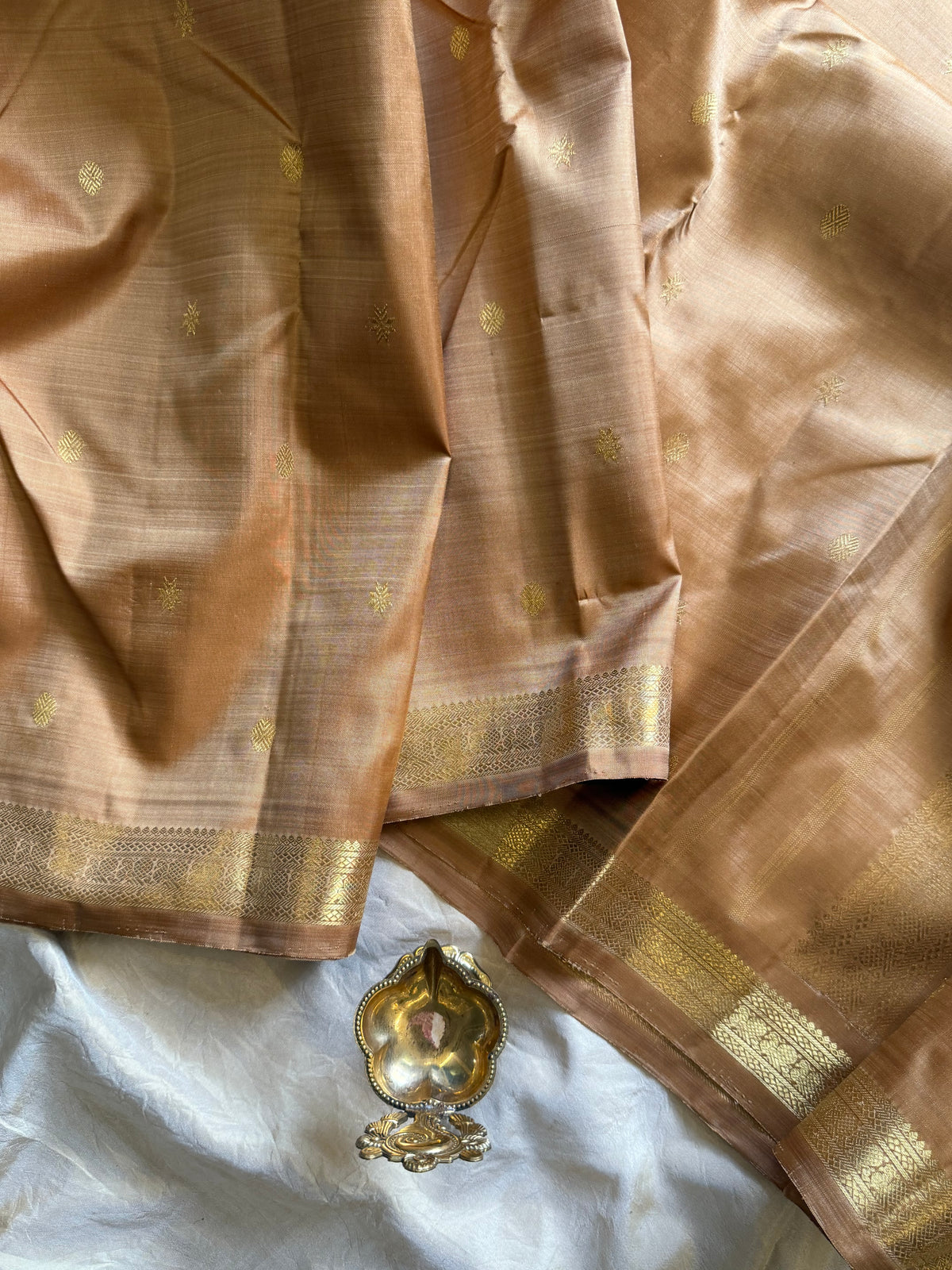 Golden brown color pure Zari pencil border Kanjipuram