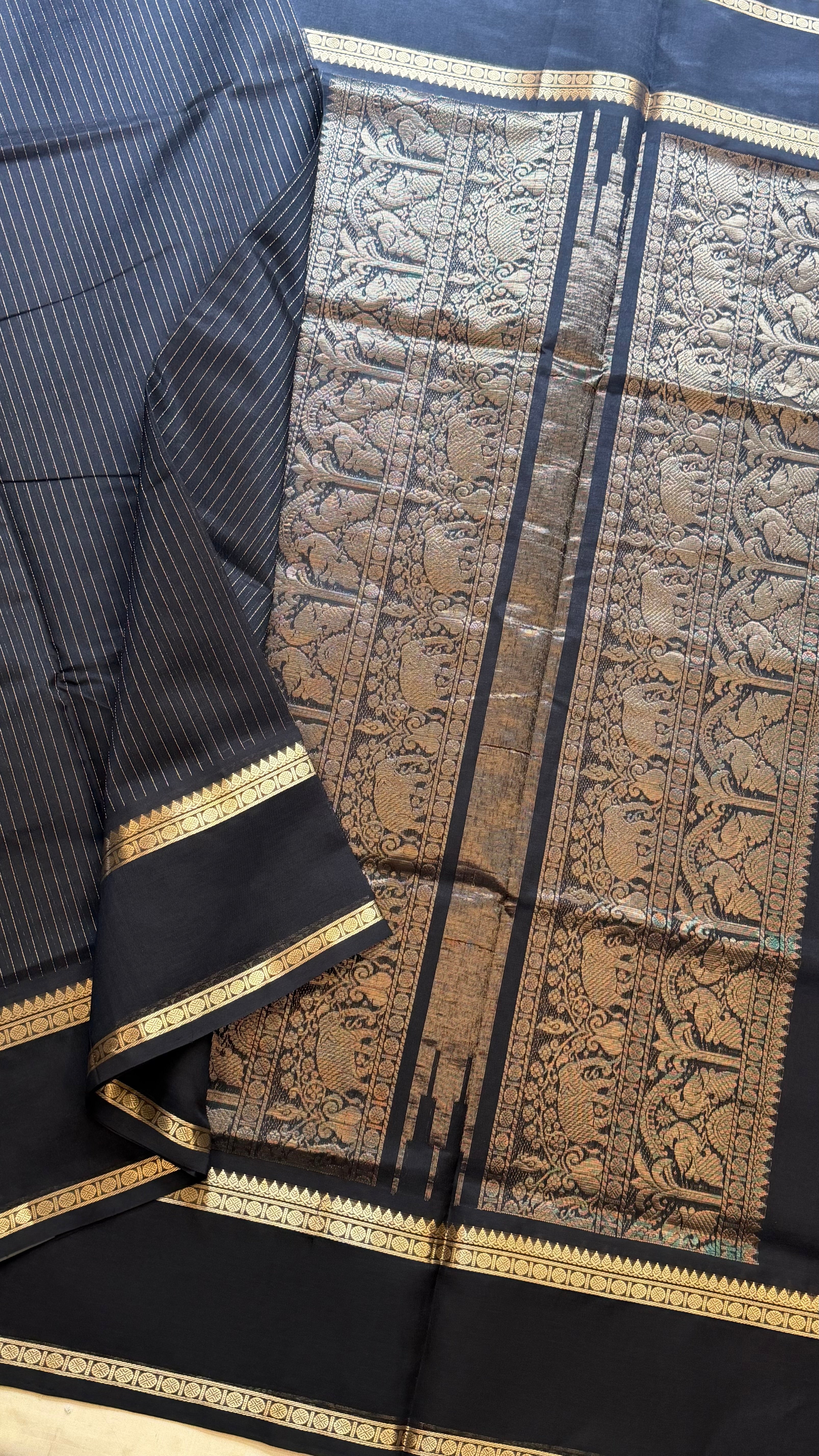 Muthu Oosi black silk cotton.