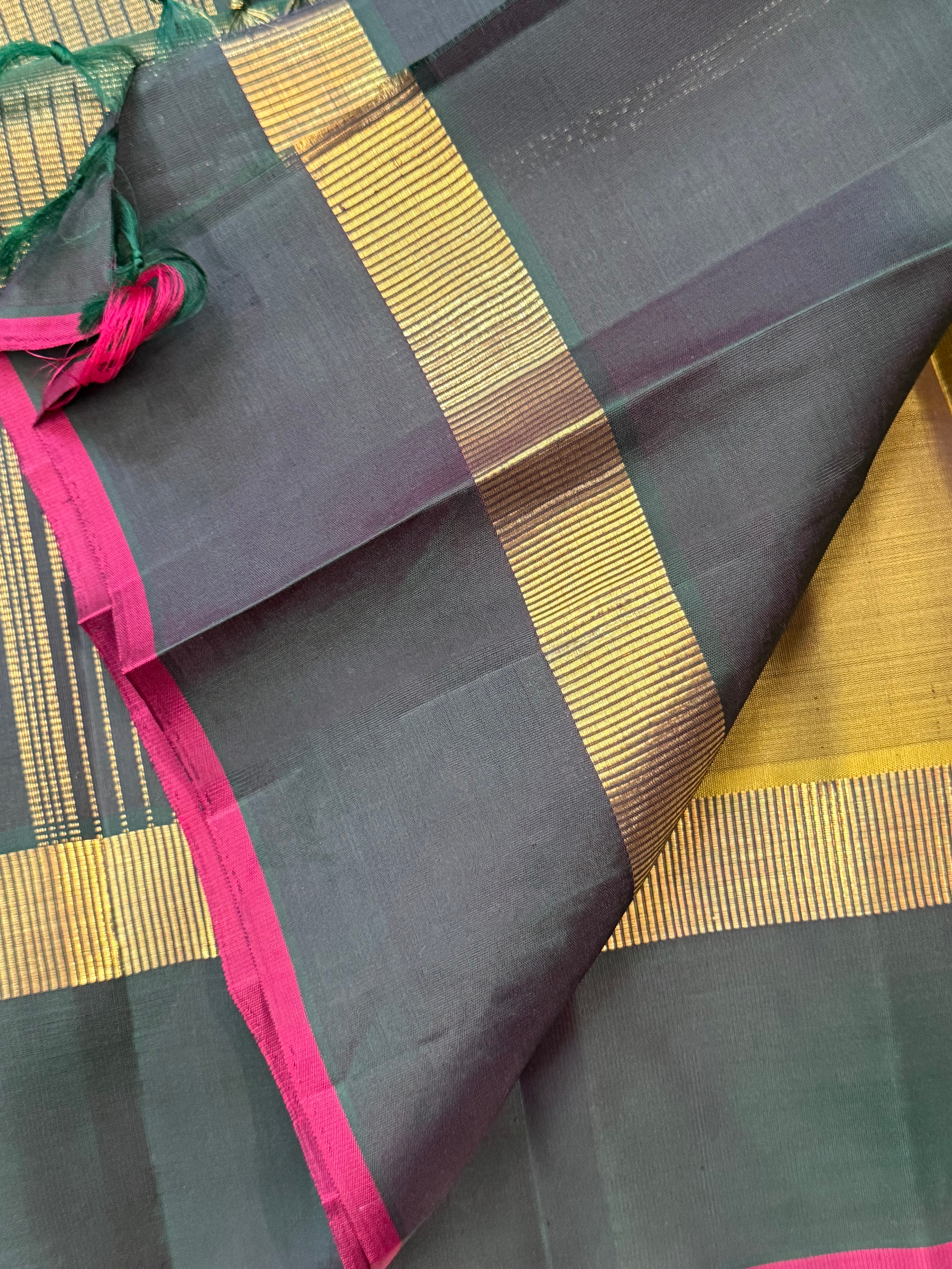 Olive green and dark green kaal erangina border/ Kanjipuram silk
