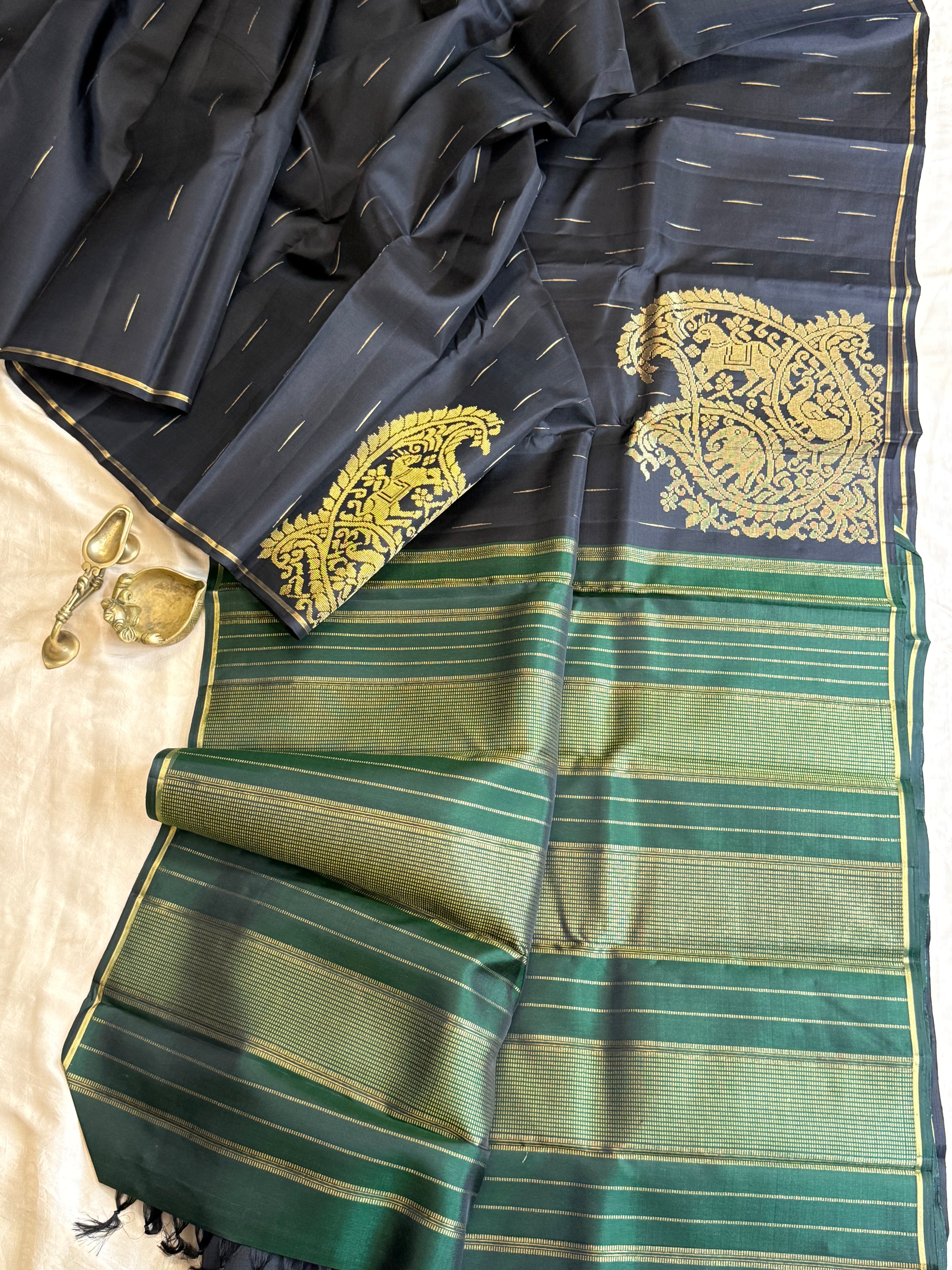 Kalai: Black Borderless Kanjivaram Silk Saree with Malli Moggu