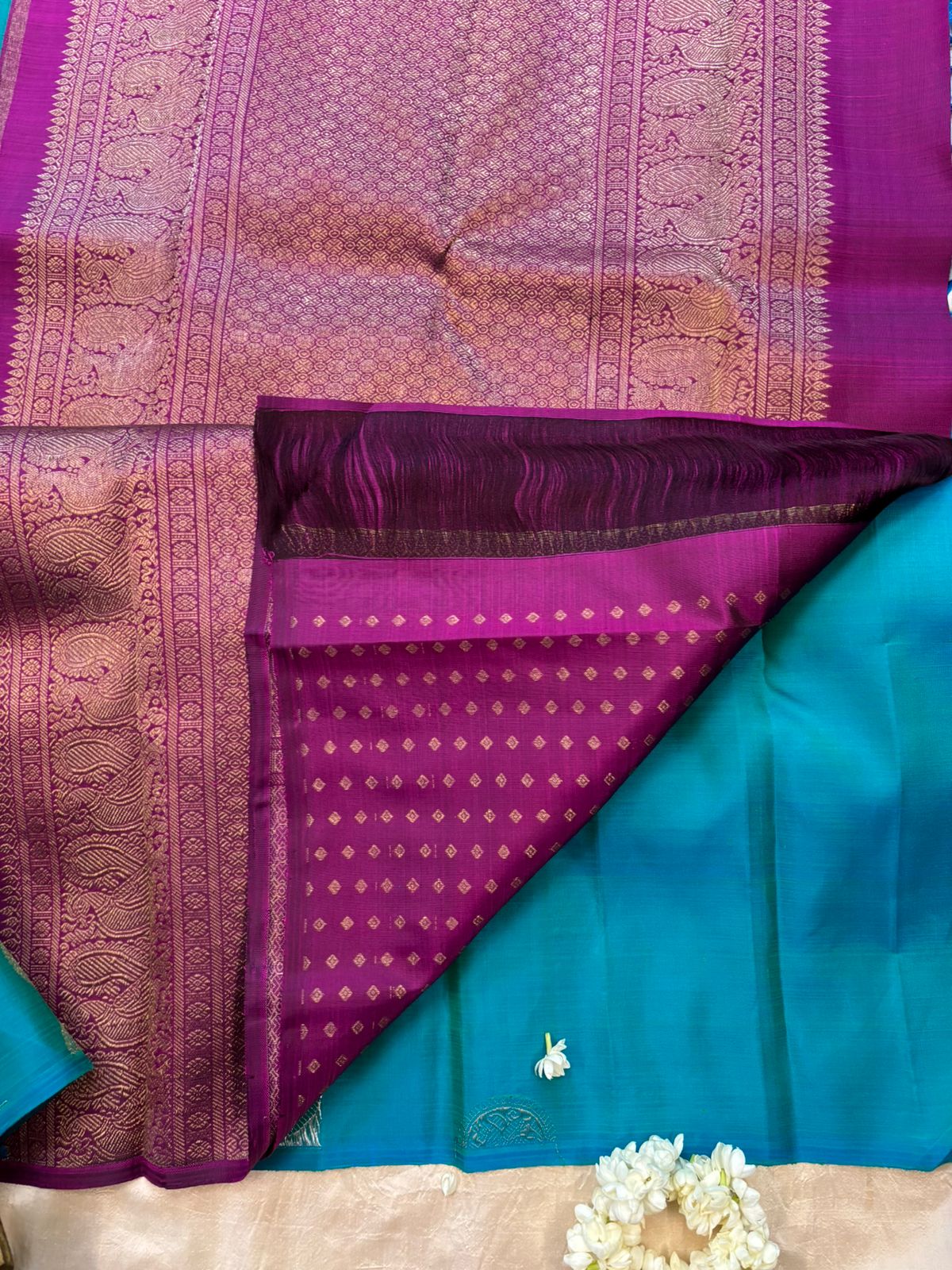 Blue shot green annam and yazhi round butta lines / kanjipuram silk