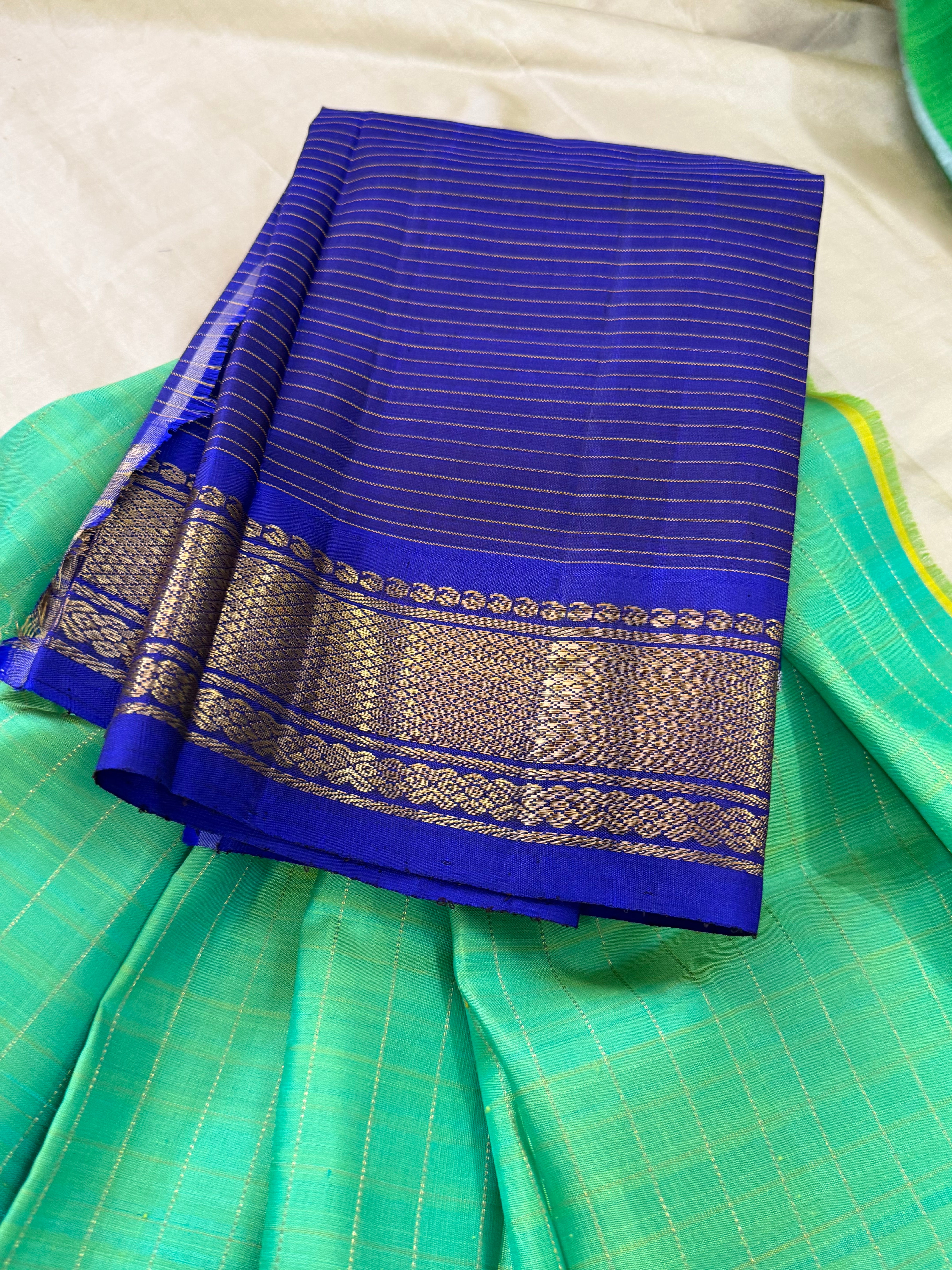 Sea green dense pet 0 to 3 years pure Zari Pattu Paavadai Korvai