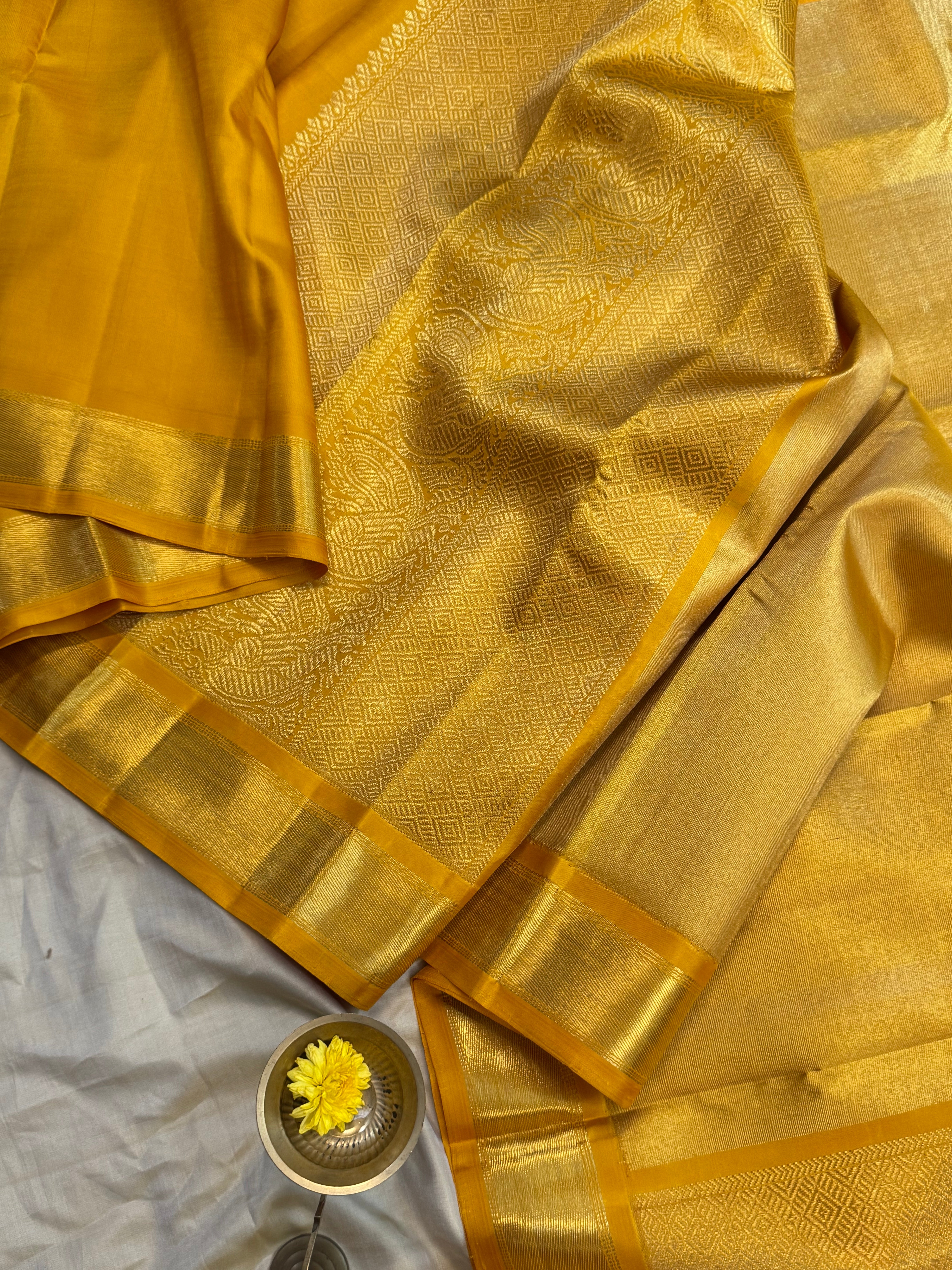 Golden mustard yellow berhampuri style long Palla kanjipuram silk.