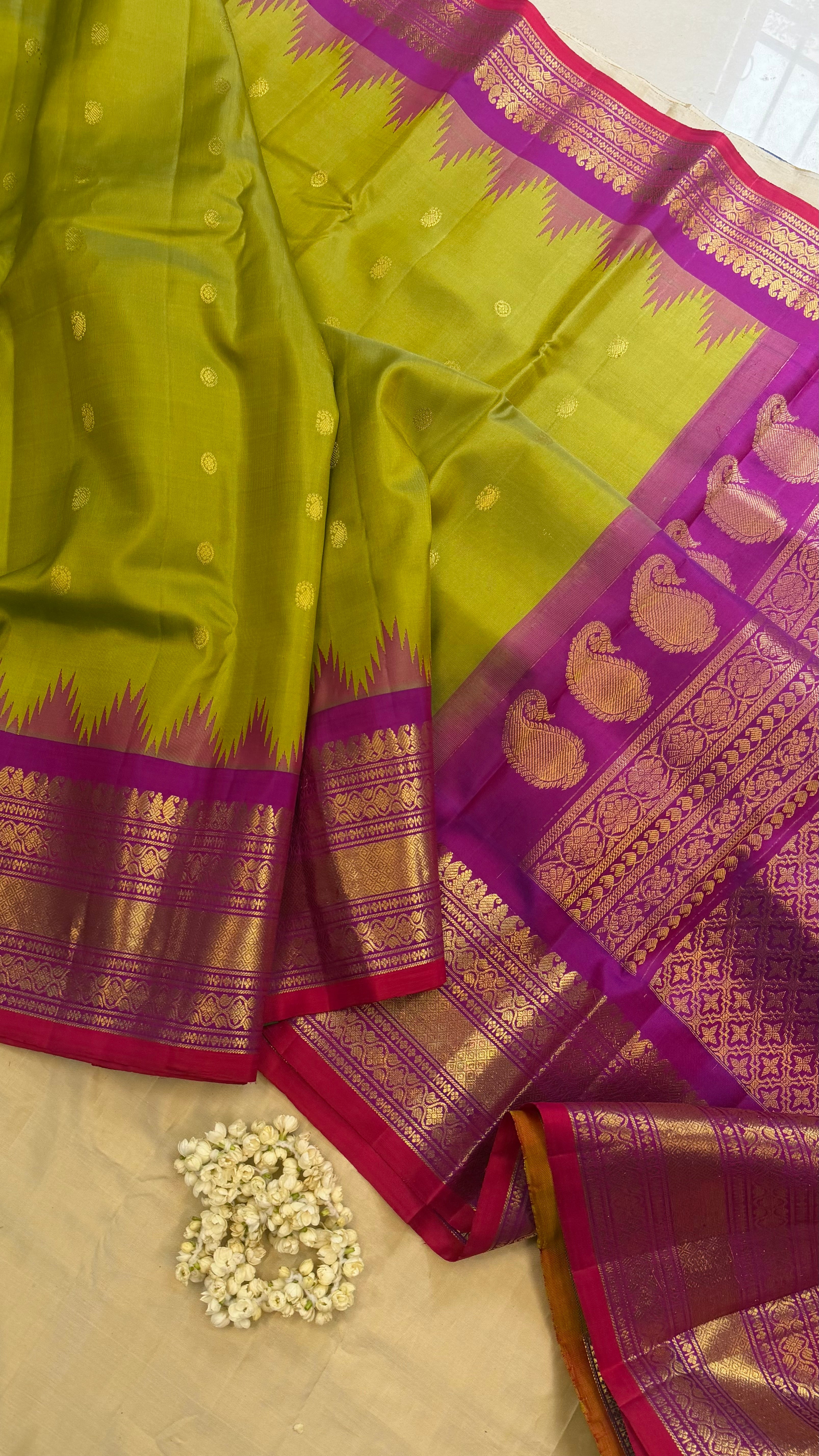 Sneha green with purple. / Gadwal silk