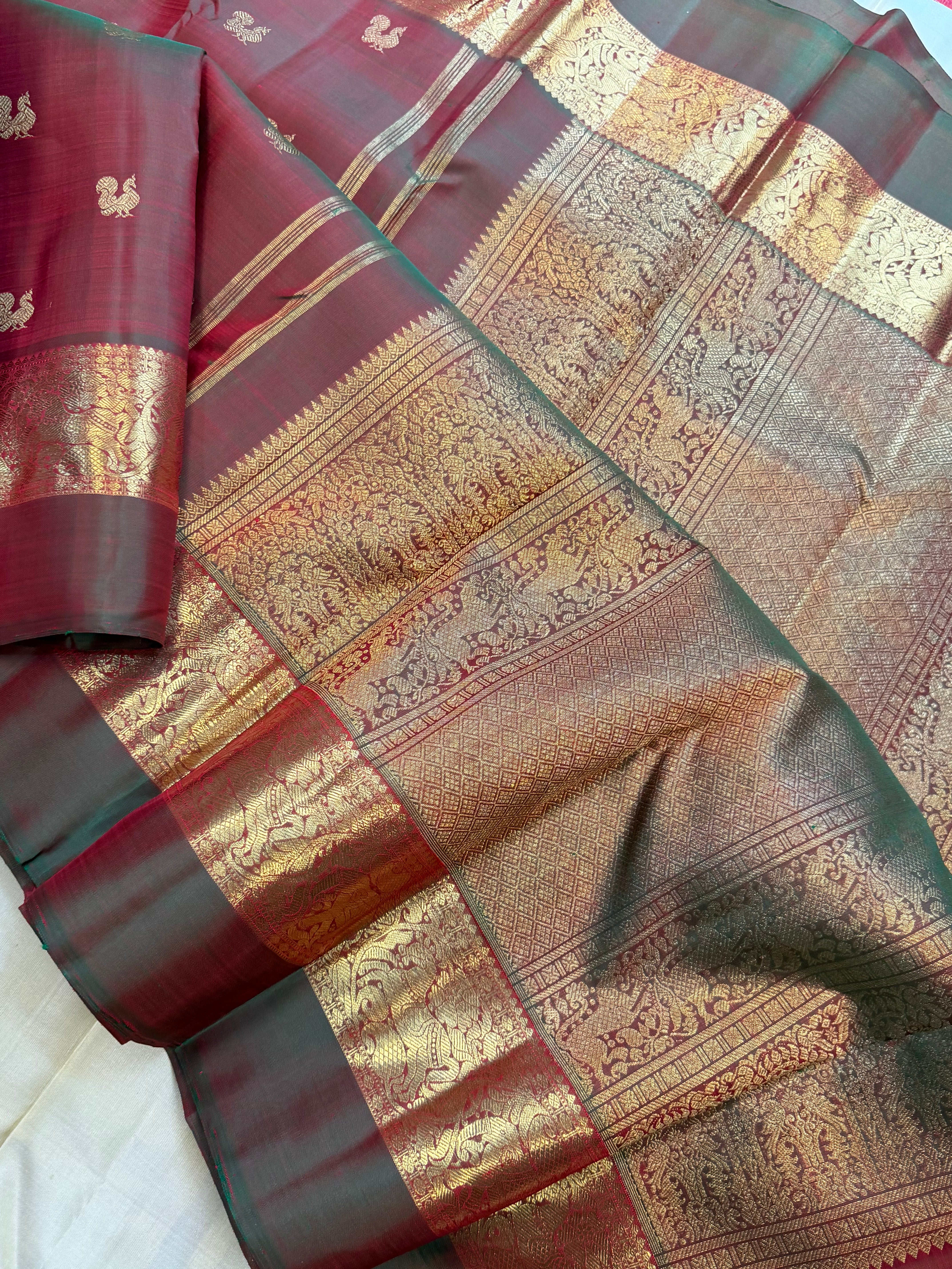 Mann : kaal erangina border earthy hues in pure Zari Kanjipuram silk