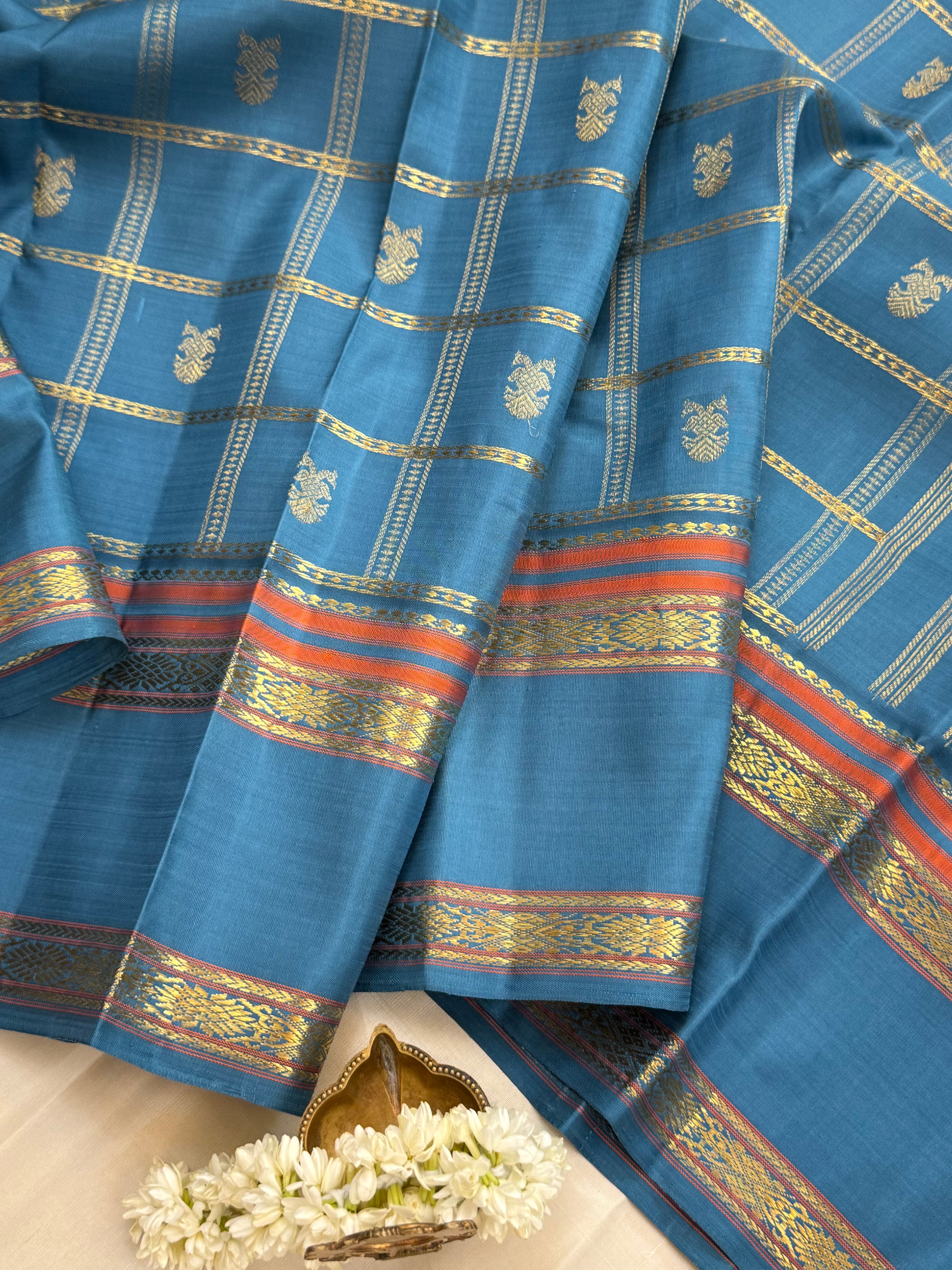 Master weaver Powder blue Kattam Butta Kanjipuram silk