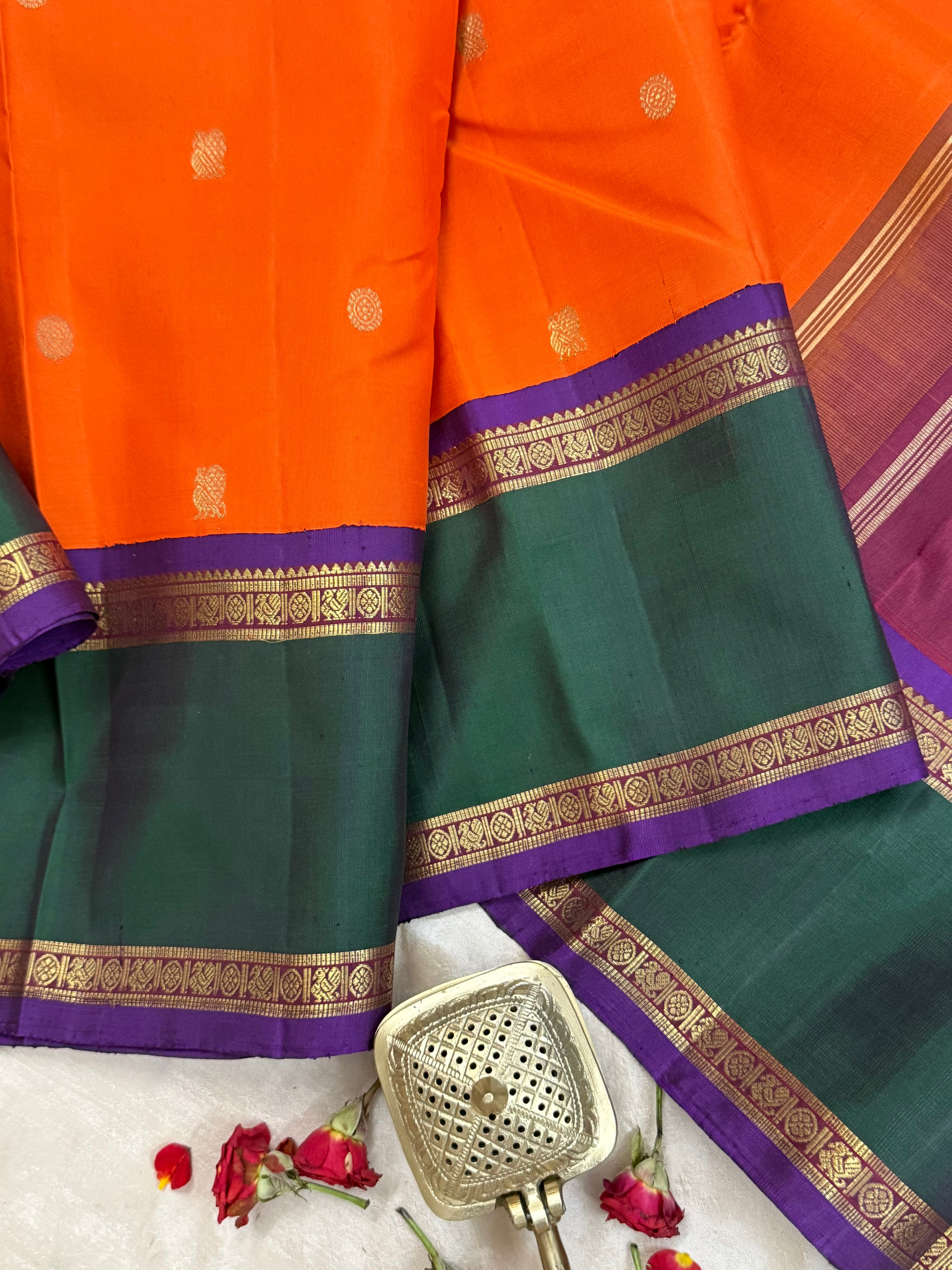 Orange and green border - Deep Araku pallu kai korvai/ Kanjipuram silk