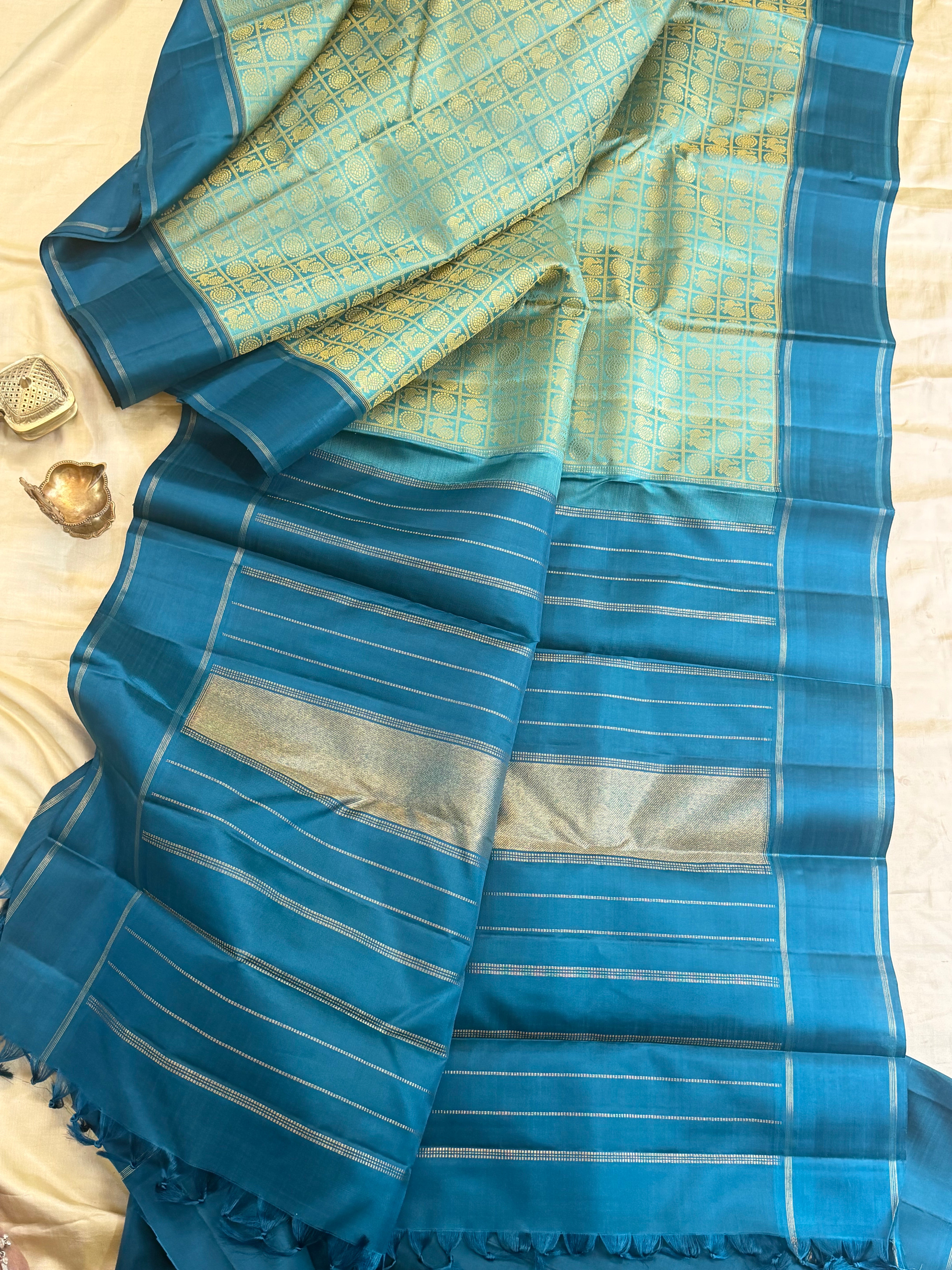 Teal blue 1000 Butta pure Zari Kanjipuram silk