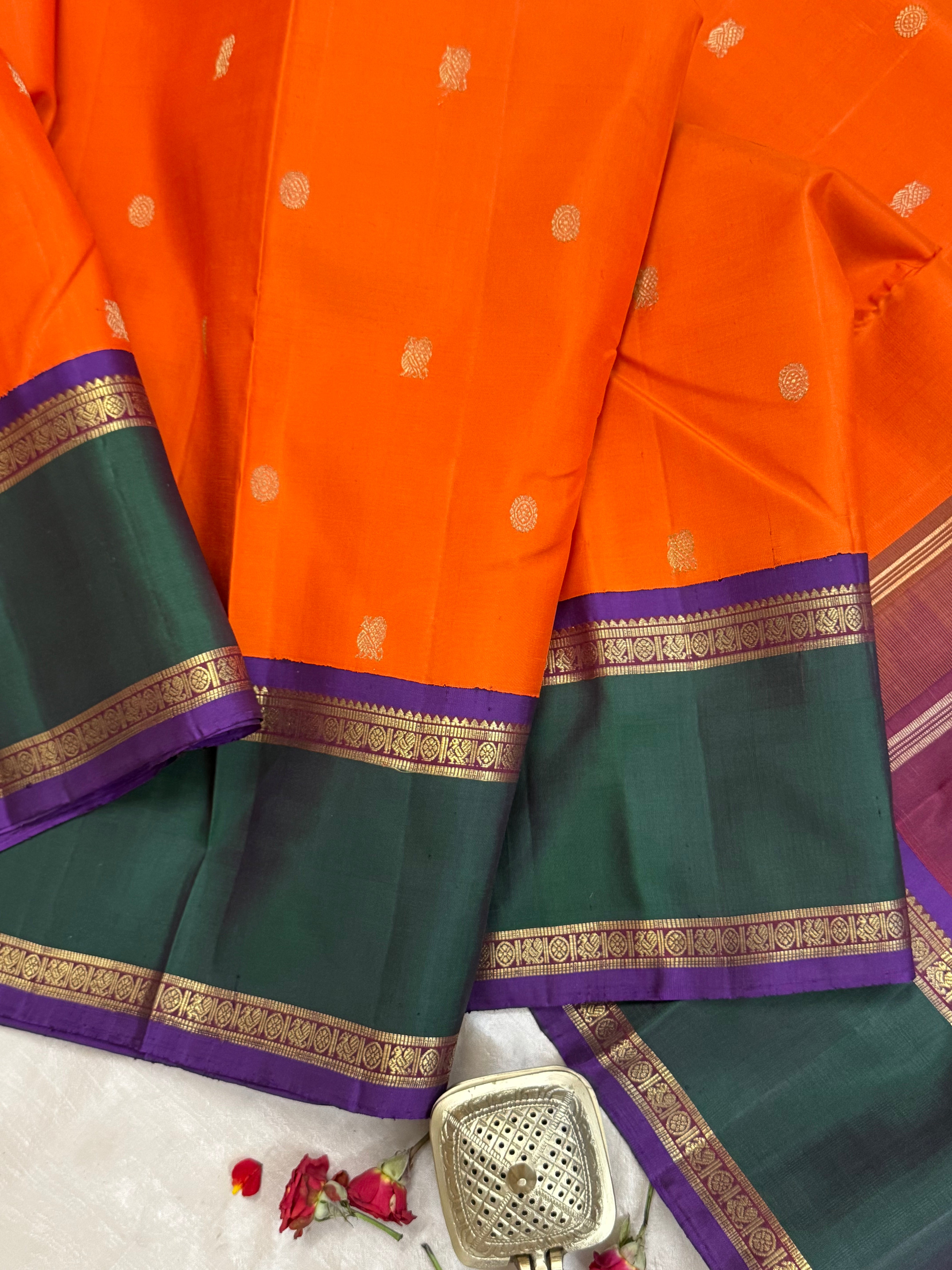 Orange and green border - Deep Araku pallu kai korvai/ Kanjipuram silk