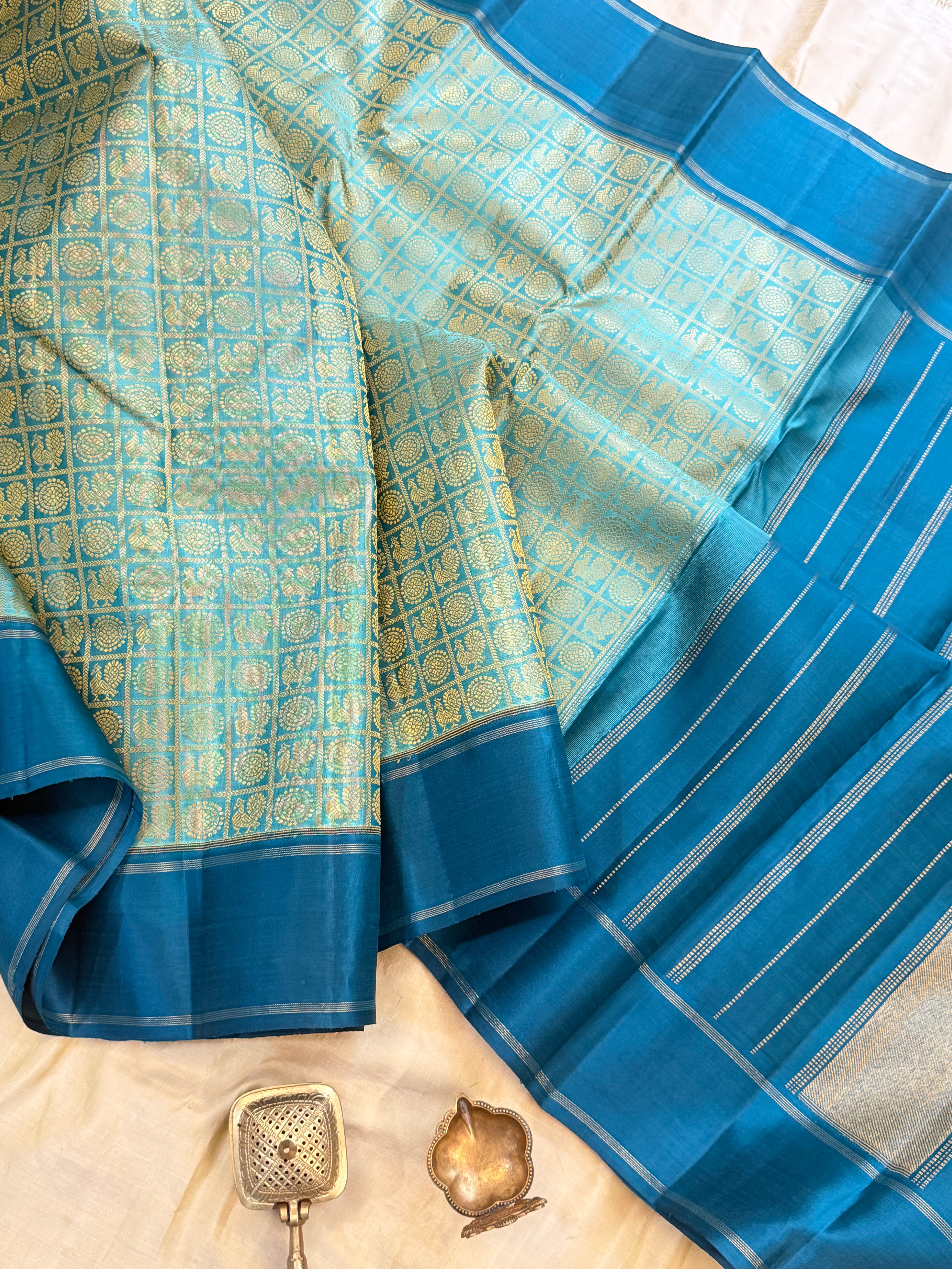 Teal blue 1000 Butta pure Zari Kanjipuram silk
