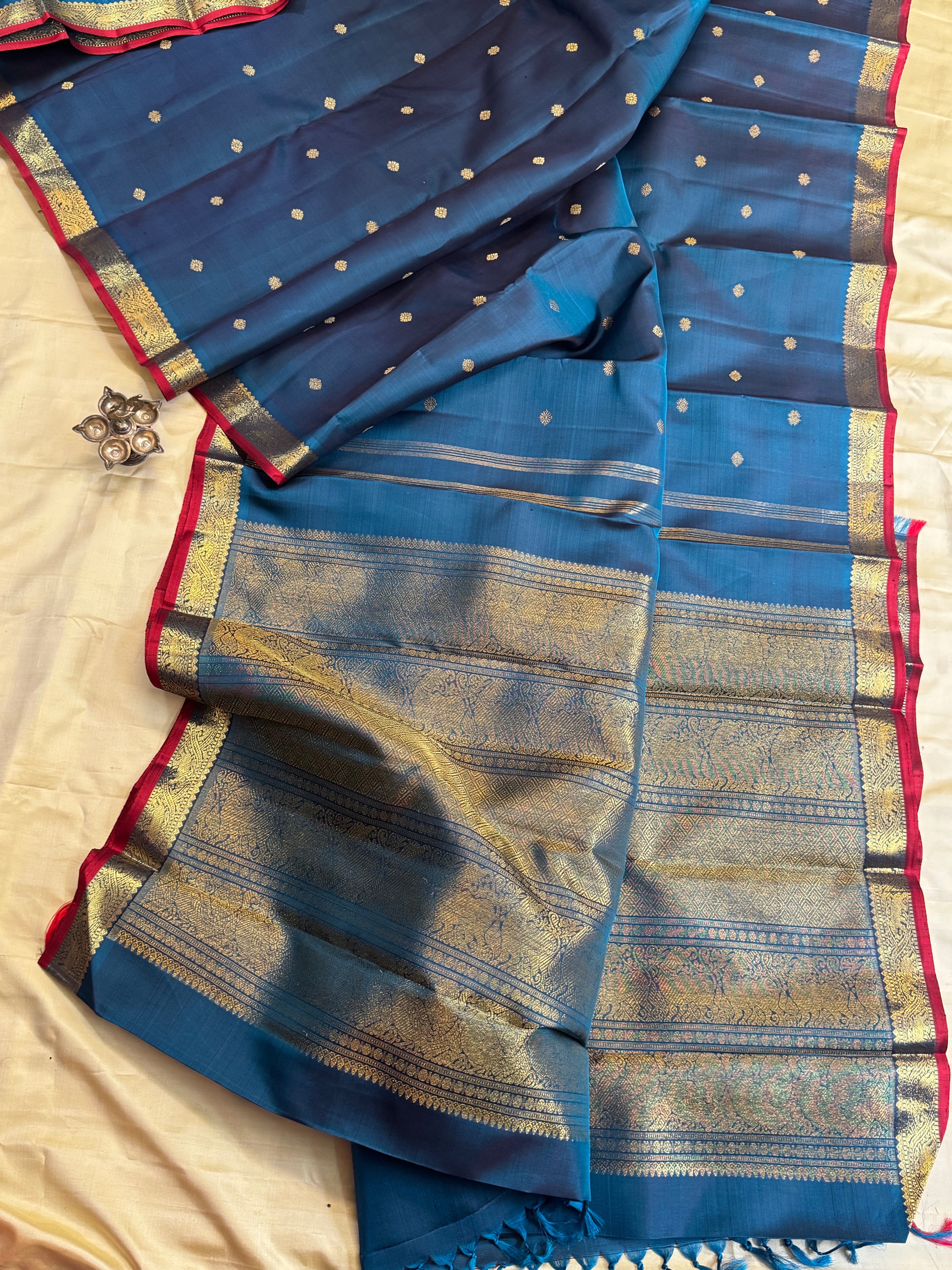 Teal blue small border classic kanjipuram silk