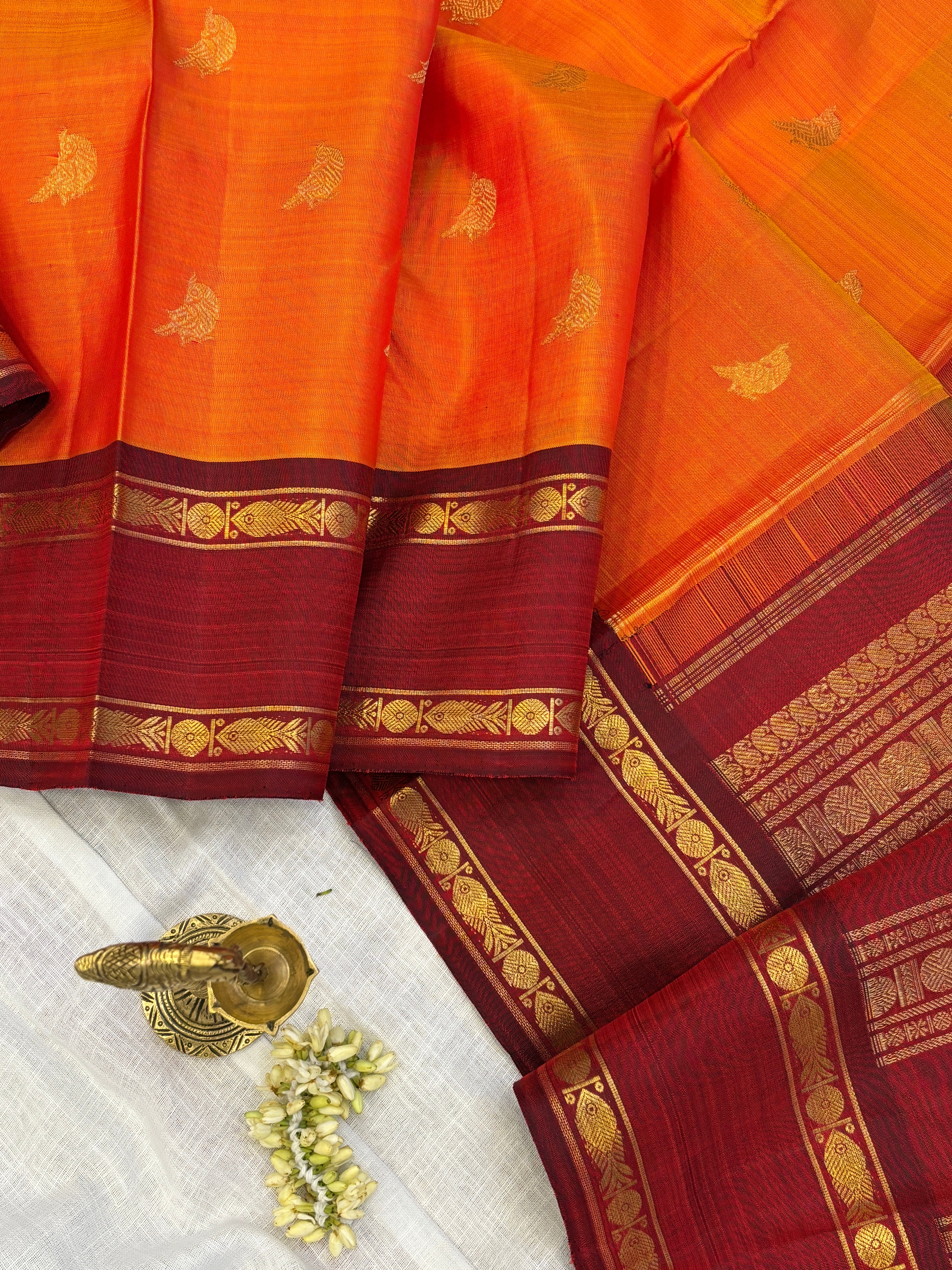 Rustic orange and araku rettapet / kanjipuram silk