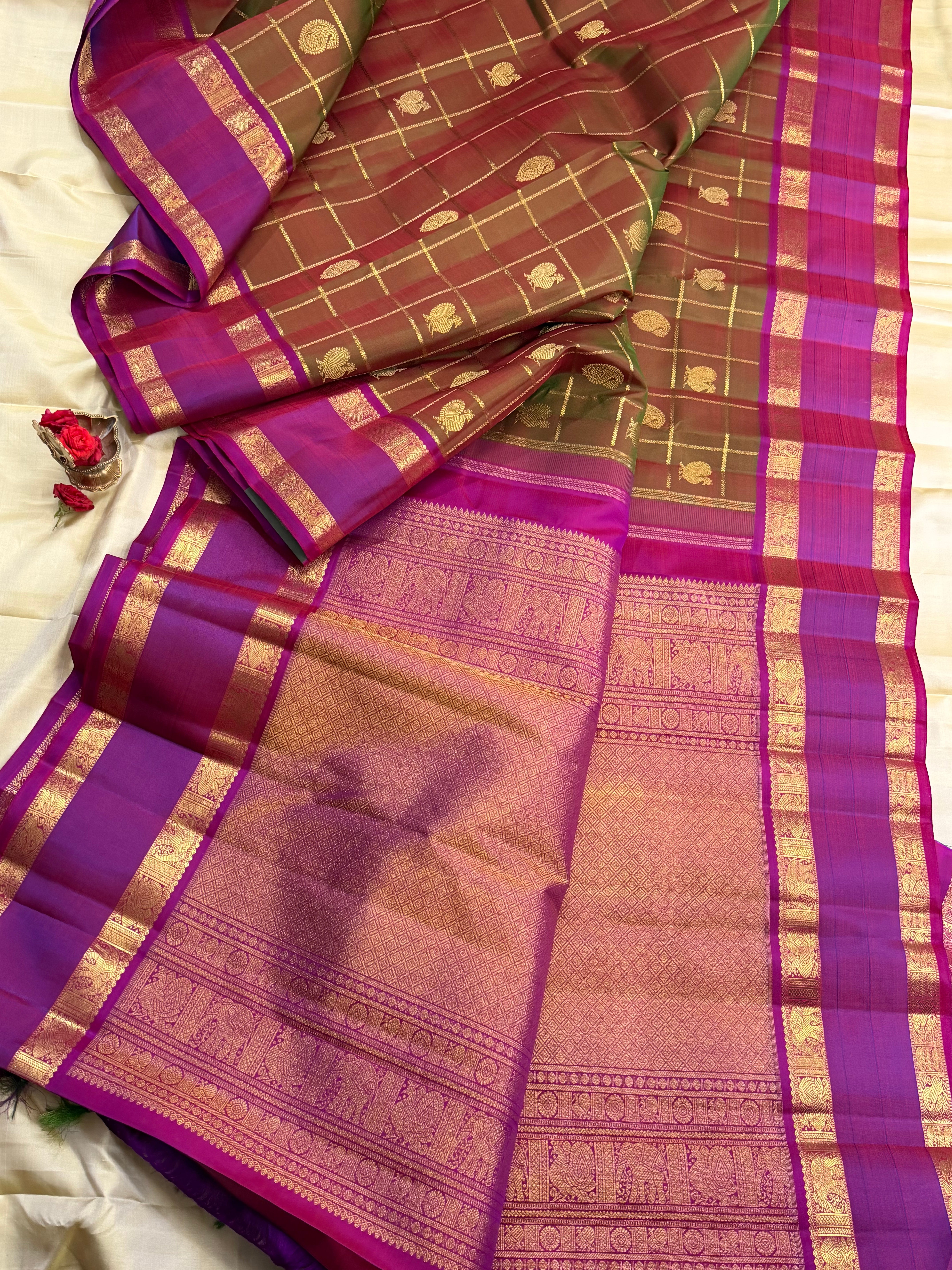 Mann : manthulir Kattam earthy hues in pure Zari Kanjipuram silk