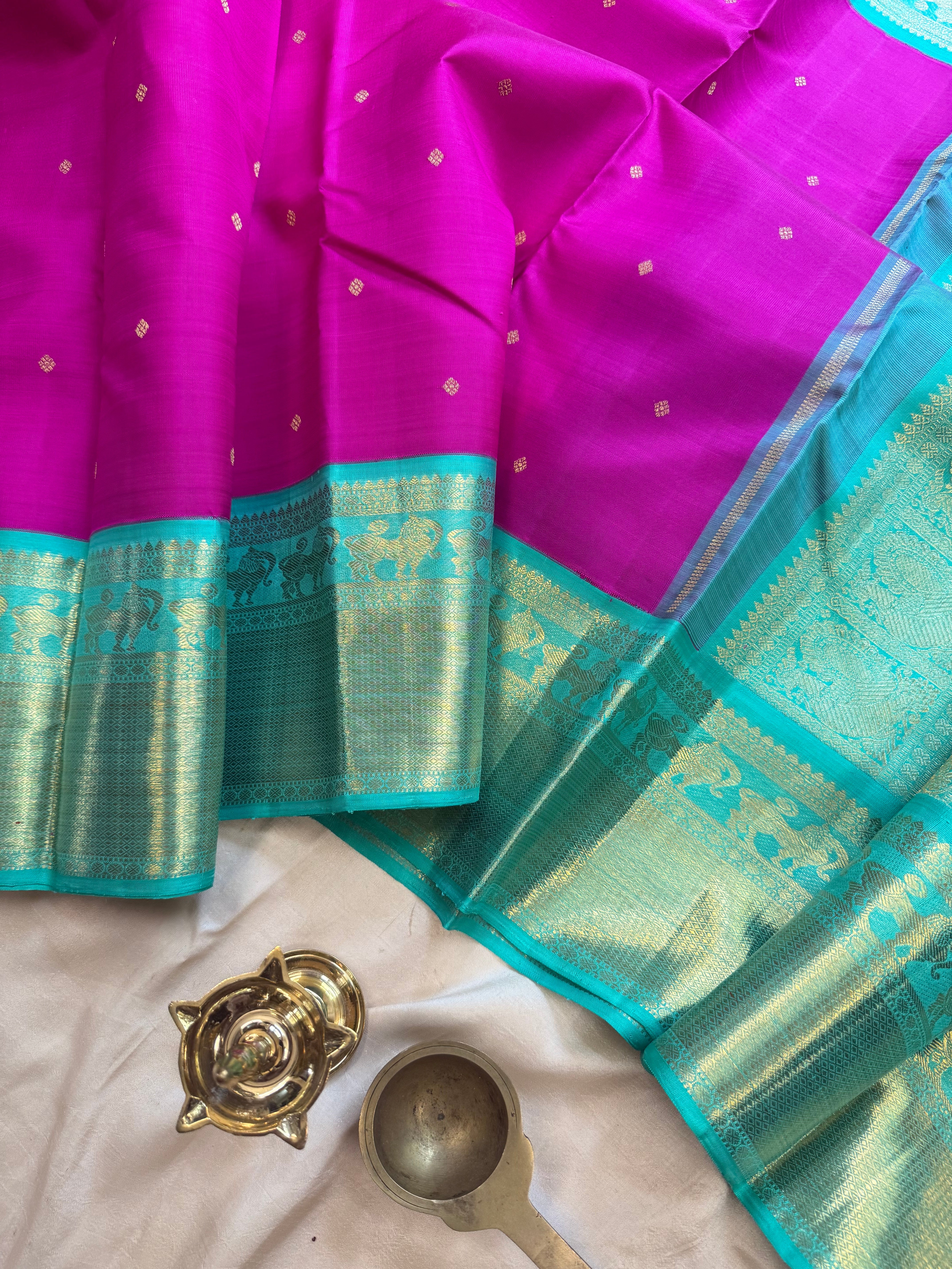 Magenta And Sea Green Korvai Kanjivaram Silk Saree