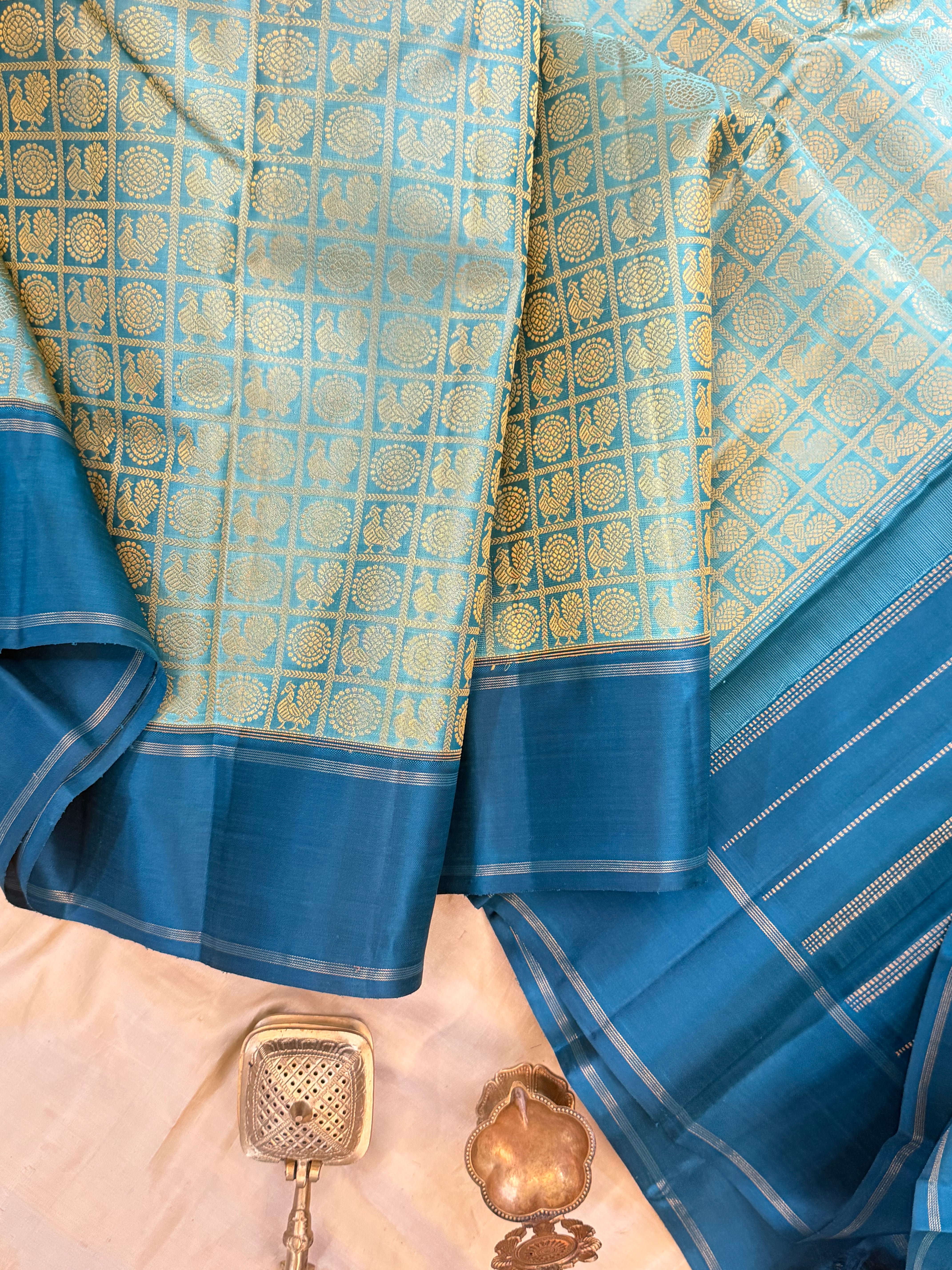 Teal blue 1000 Butta pure Zari Kanjipuram silk