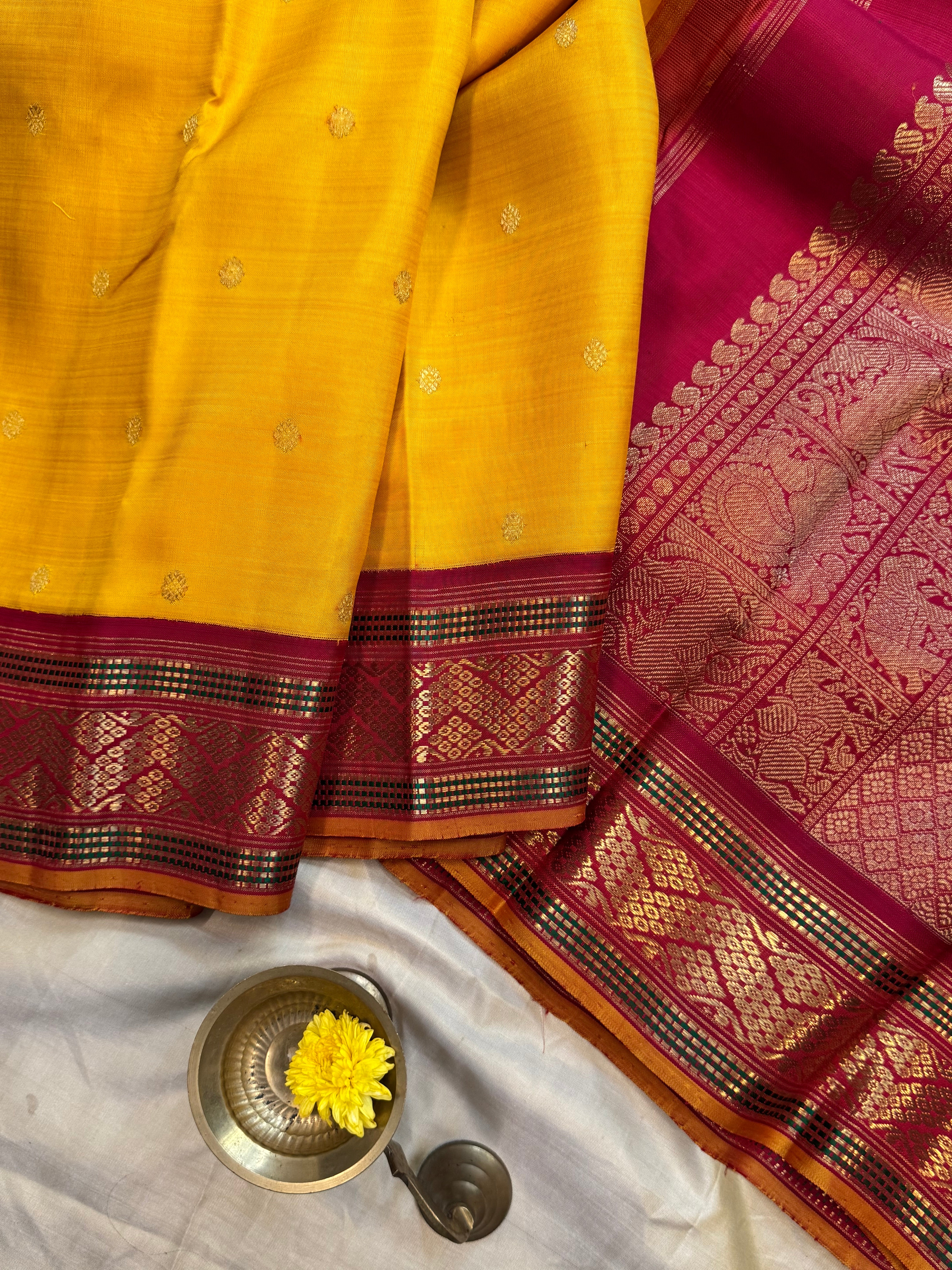 Mustard yellow vintage style adai pet kanjipuram silk.