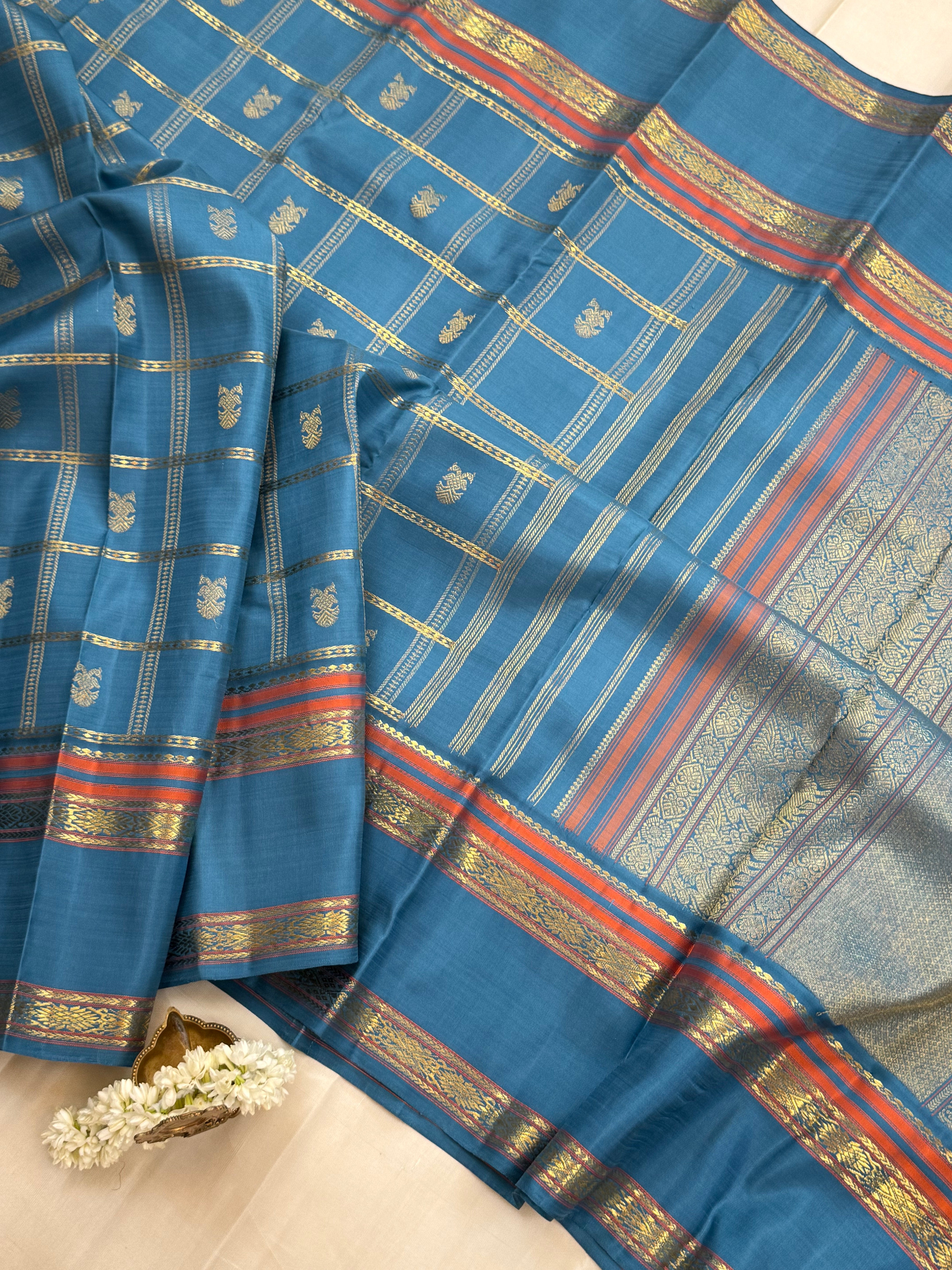 Master weaver Powder blue Kattam Butta Kanjipuram silk