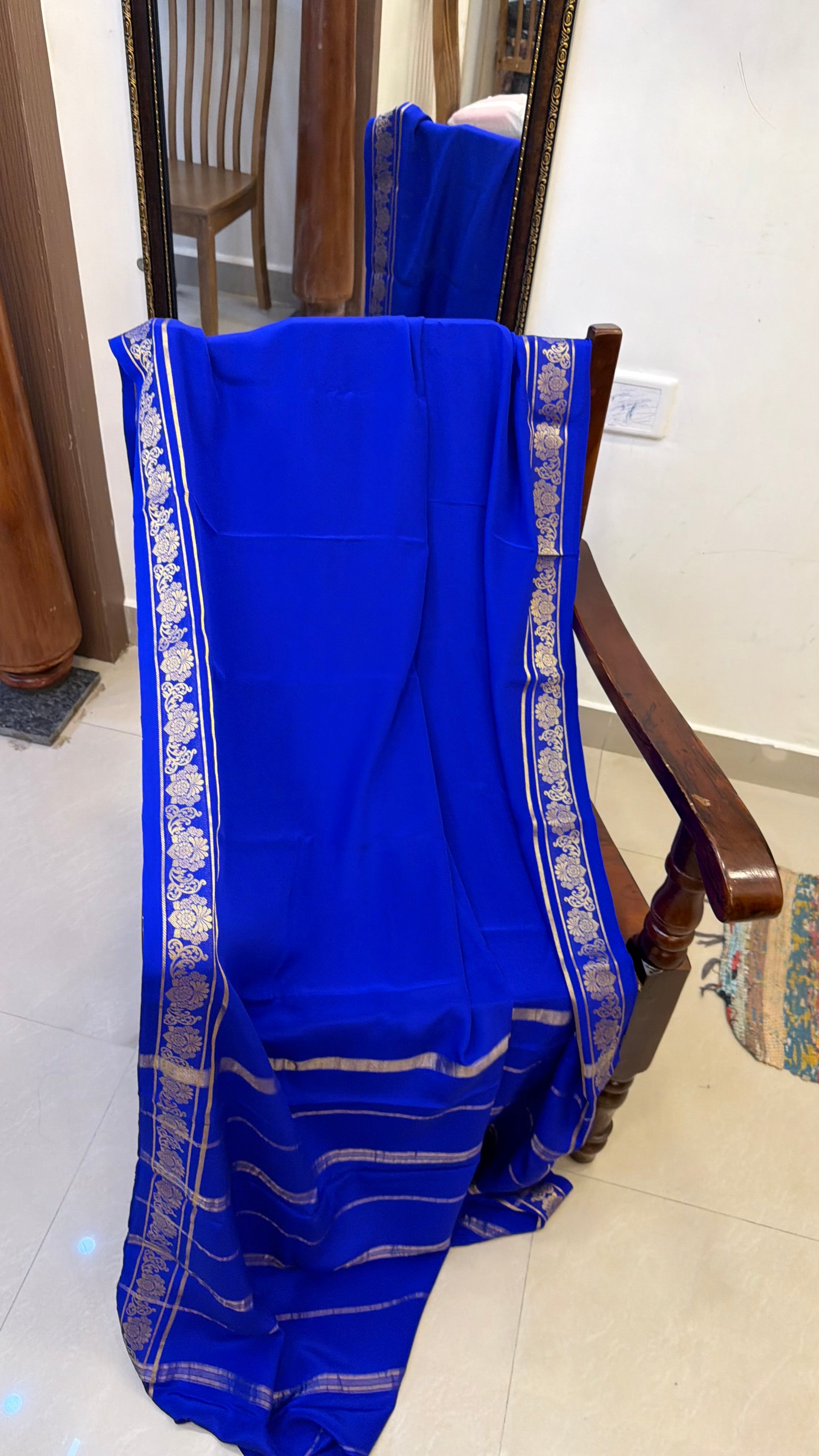 Floral border ms blue Pure crepe silk saree