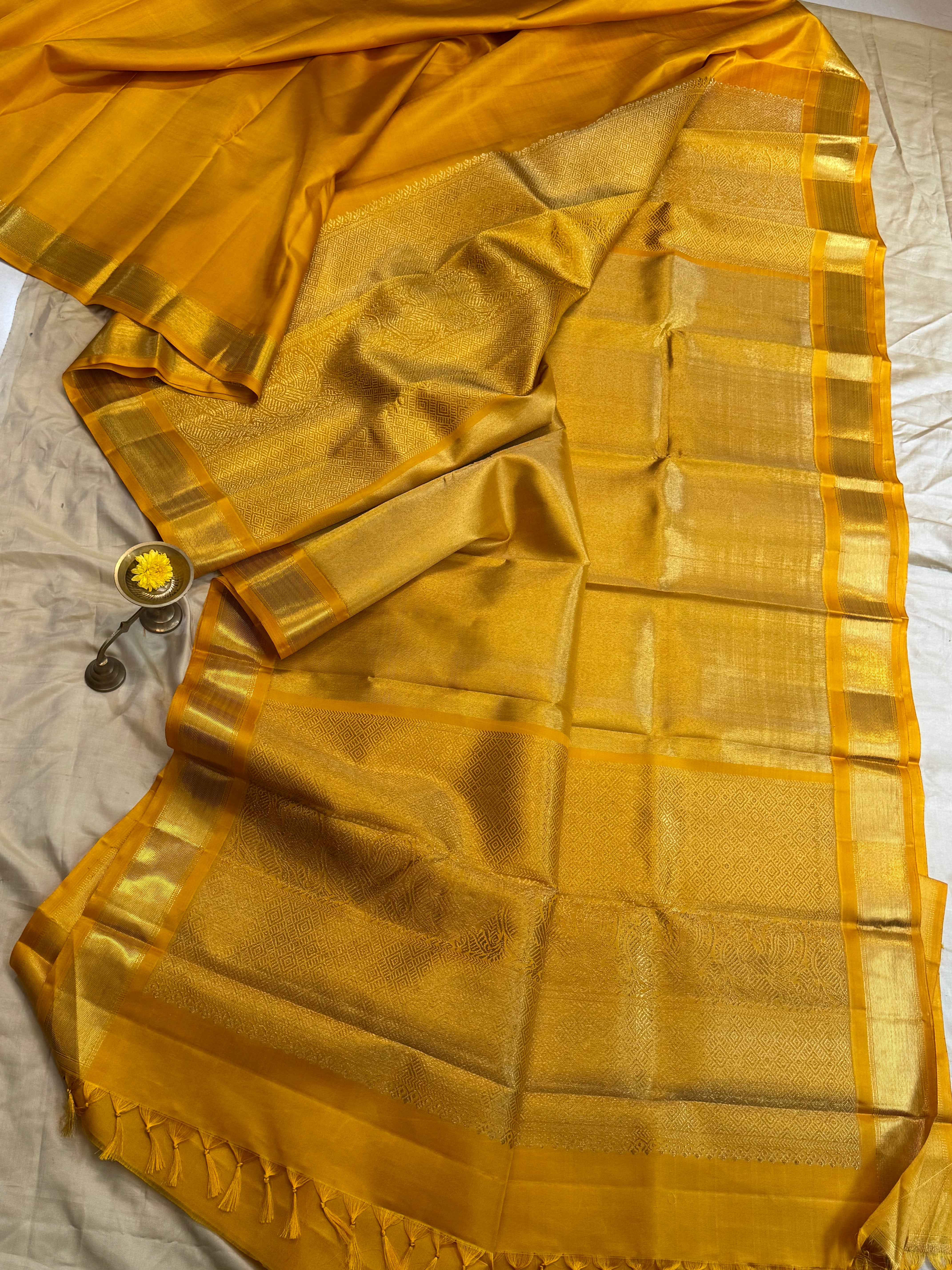 Golden mustard yellow berhampuri style long Palla kanjipuram silk.