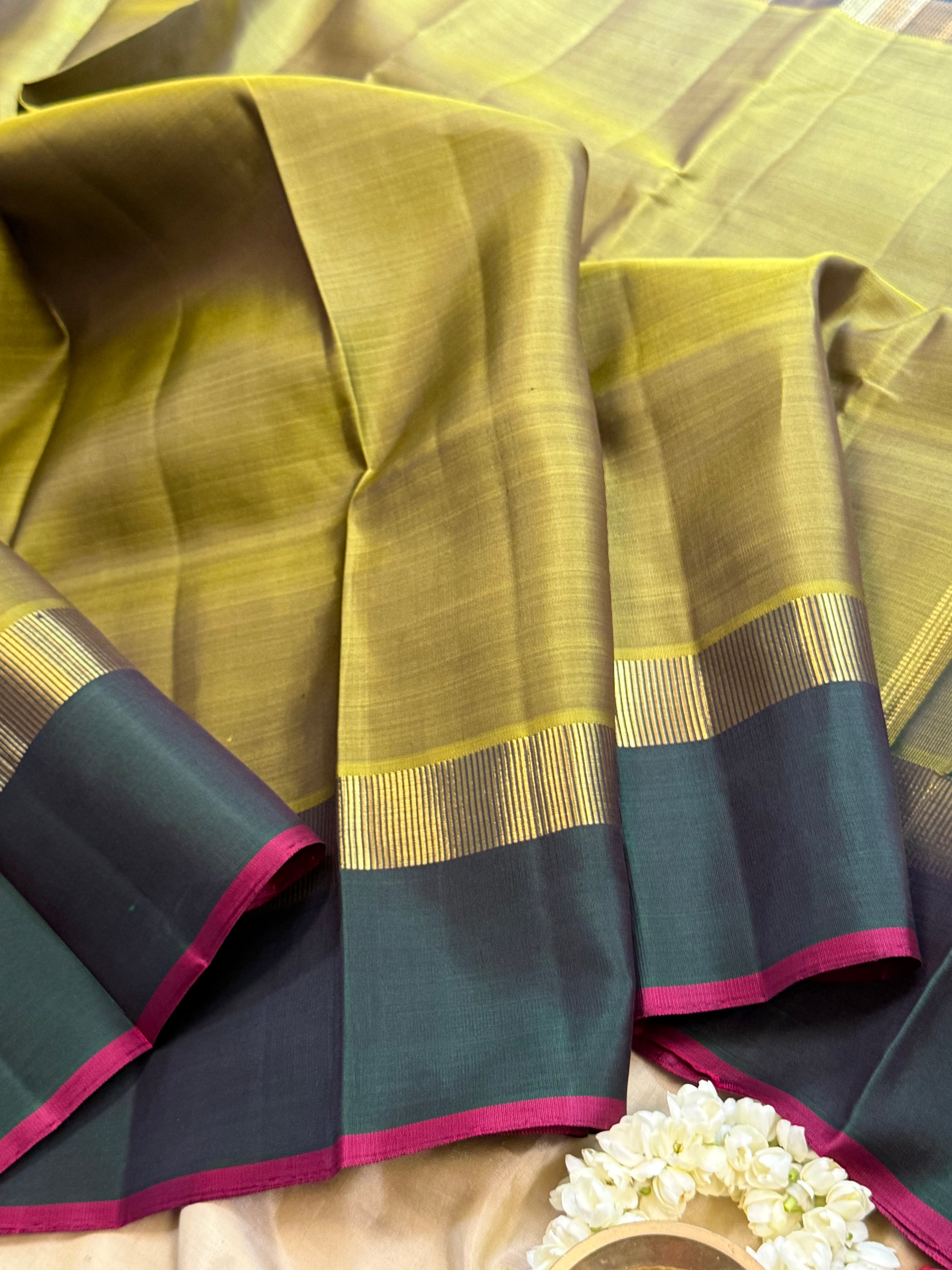 Olive green and dark green kaal erangina border/ Kanjipuram silk