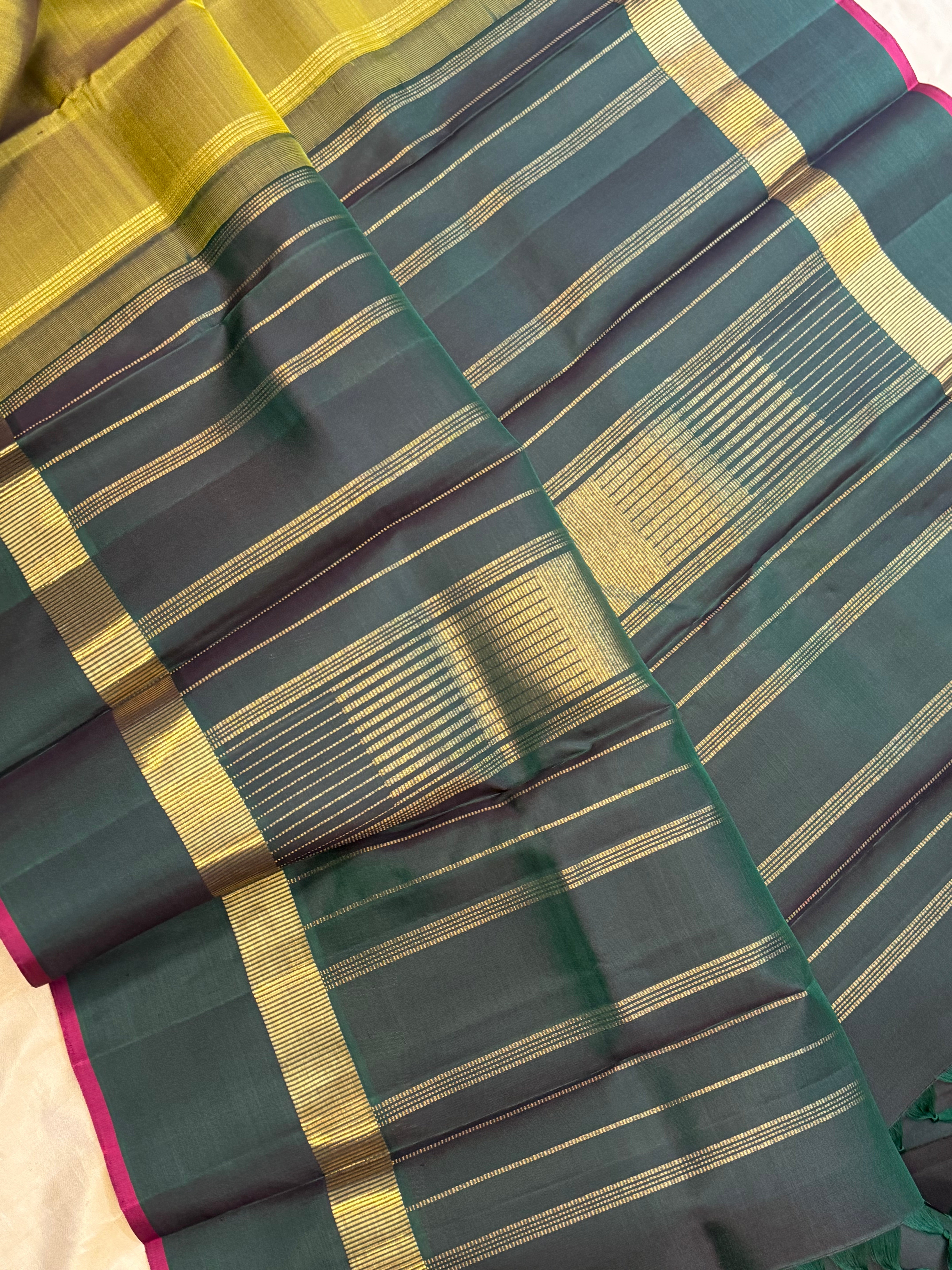 Permam : Mehandi green kaal erangina border / Kanjipuram silk CL7053
