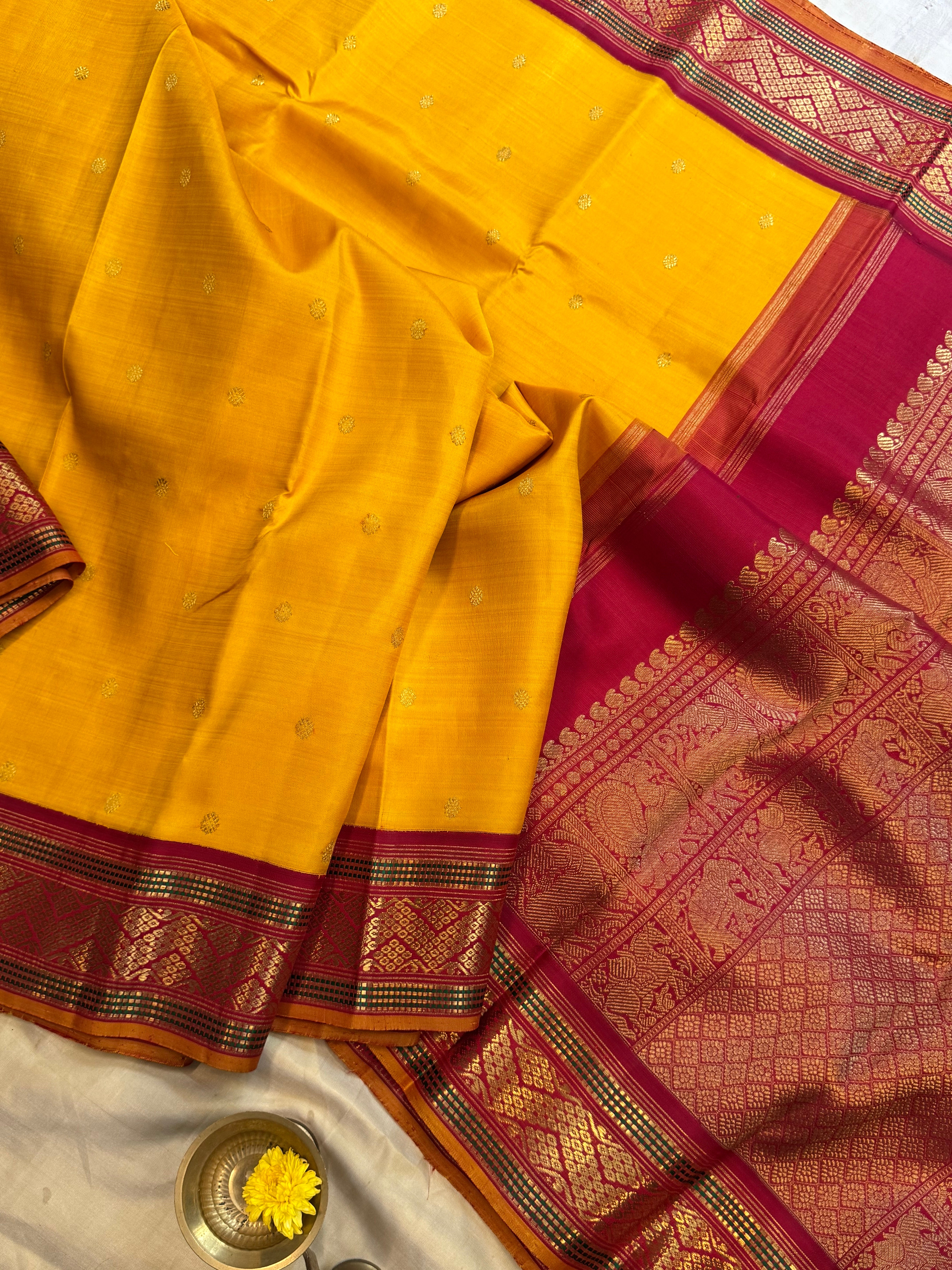 Mustard yellow vintage style adai pet kanjipuram silk.