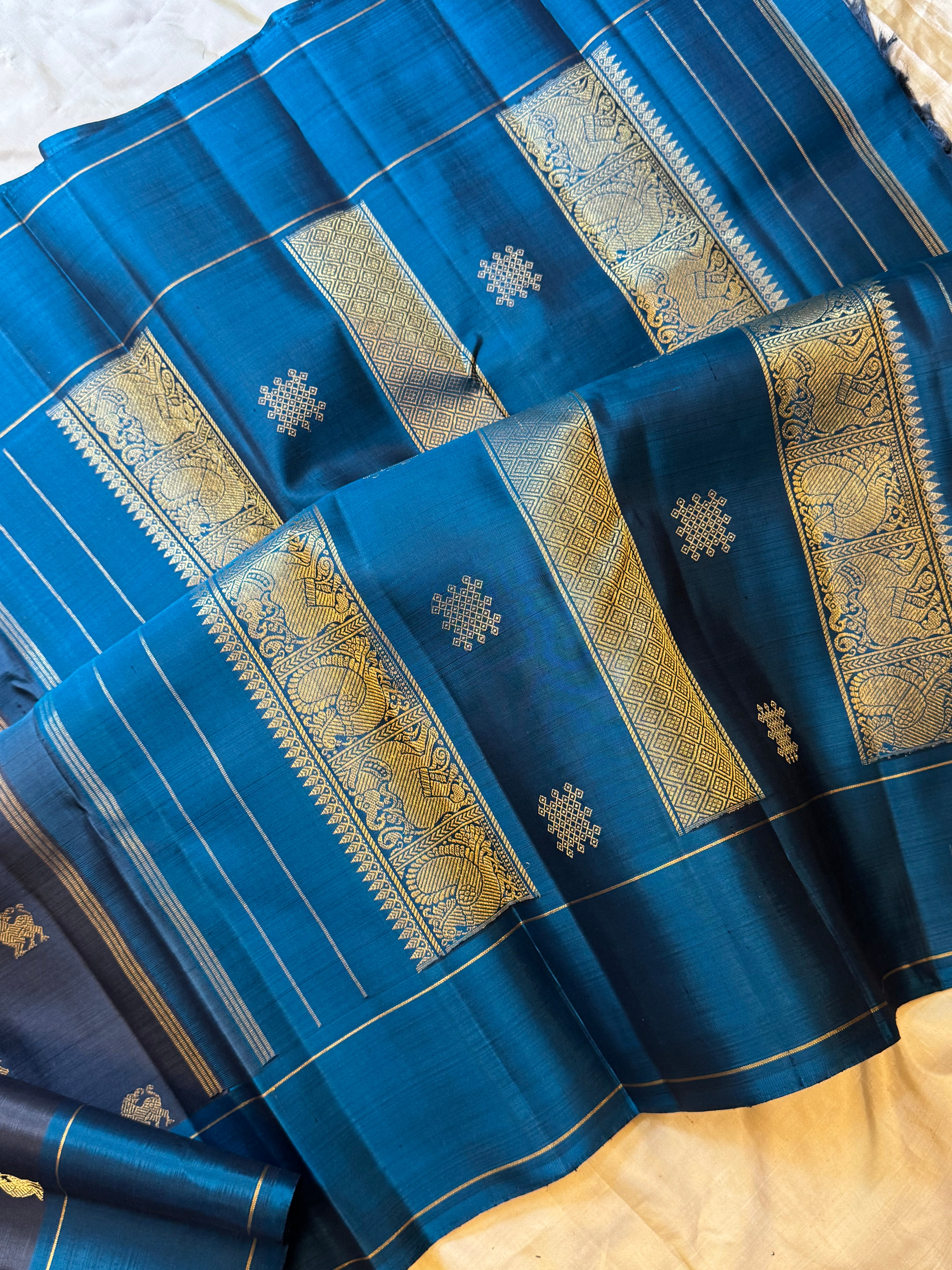 Carbon Black yazhli and teal blue/ Kanjipuram silk