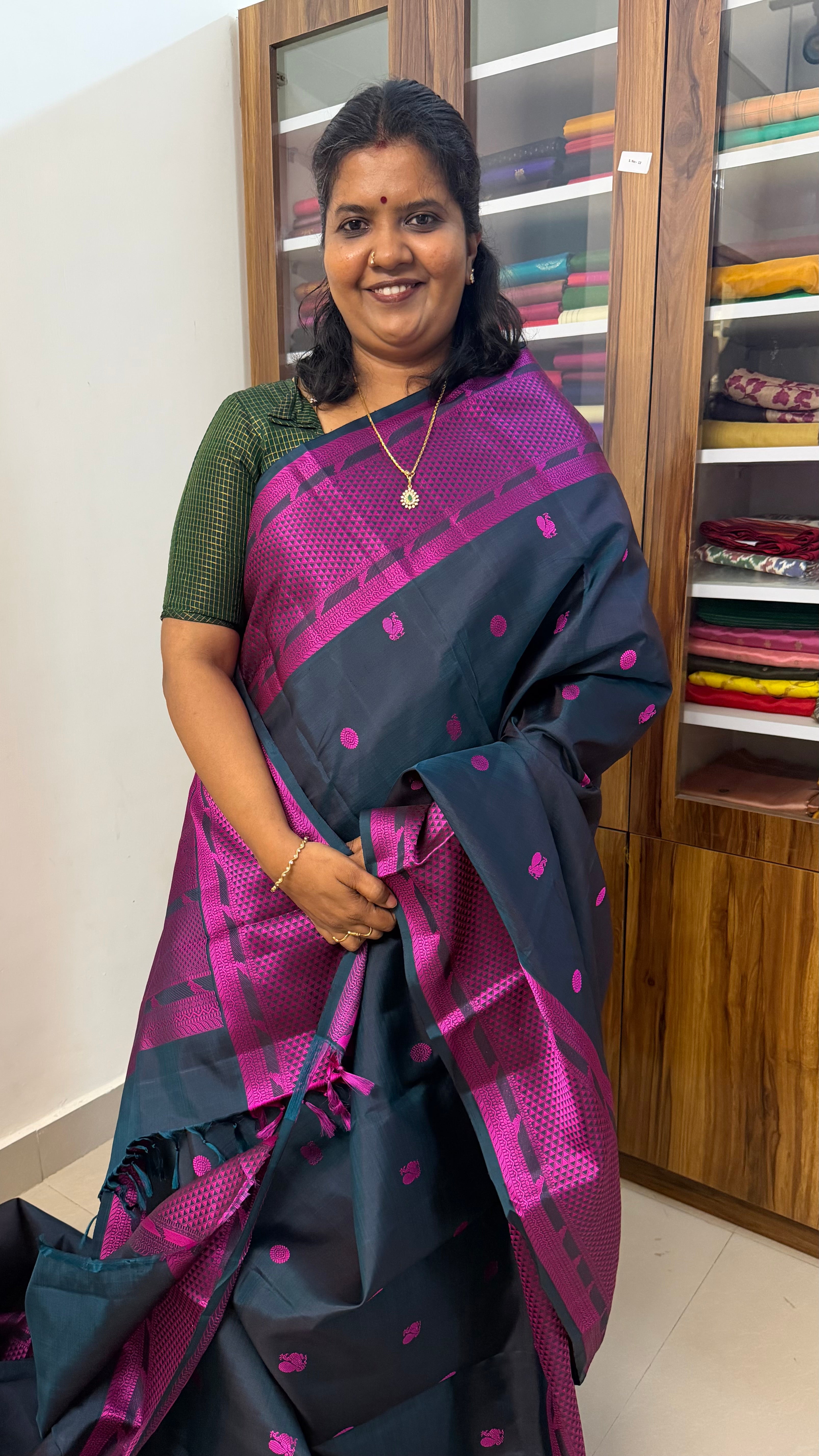 Green kili thread work Kanjipuram silk