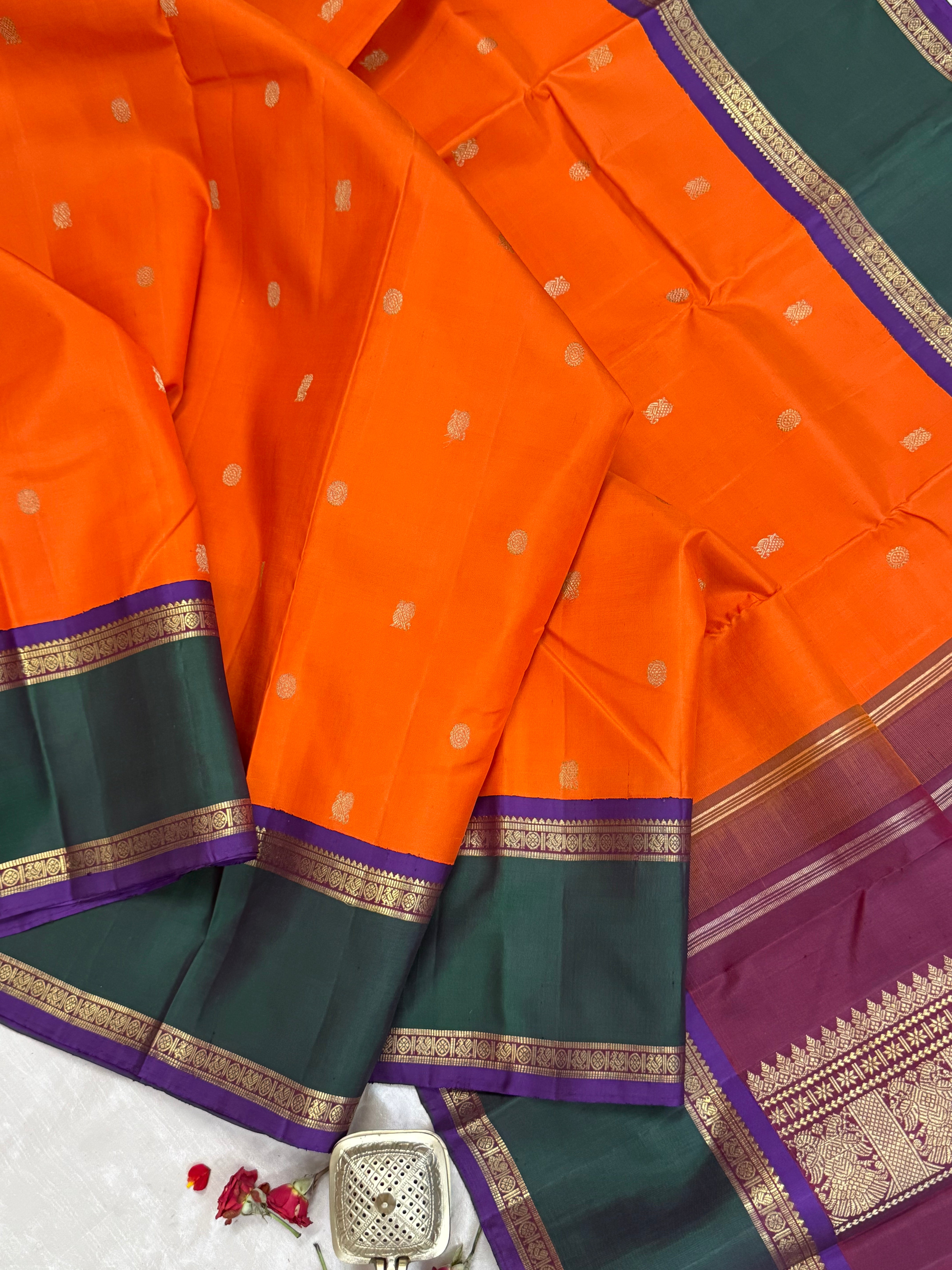 Orange and green border - Deep Araku pallu kai korvai/ Kanjipuram silk