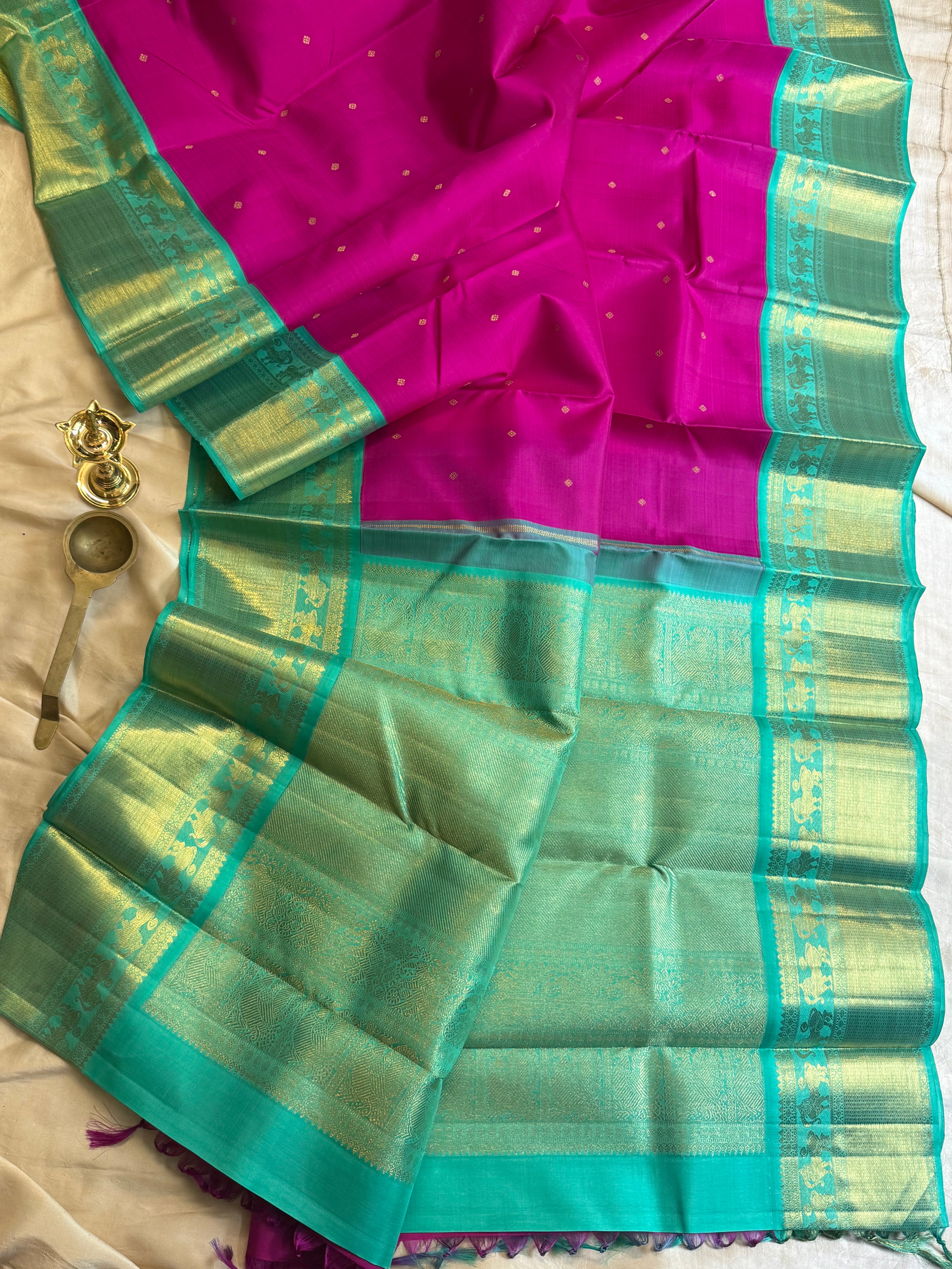 Magenta And Sea Green Korvai Kanjivaram Silk Saree