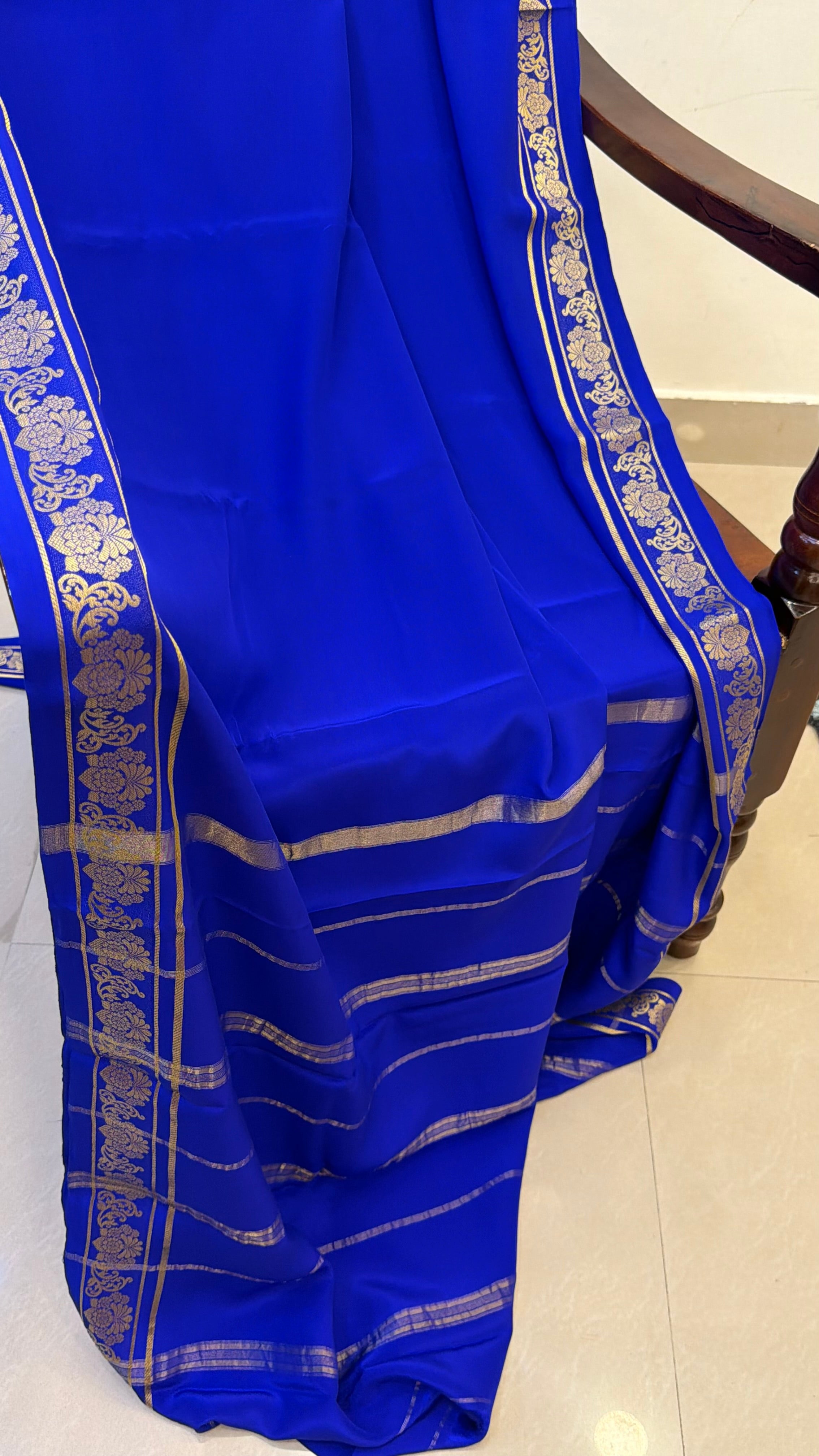 Floral border ms blue Pure crepe silk saree
