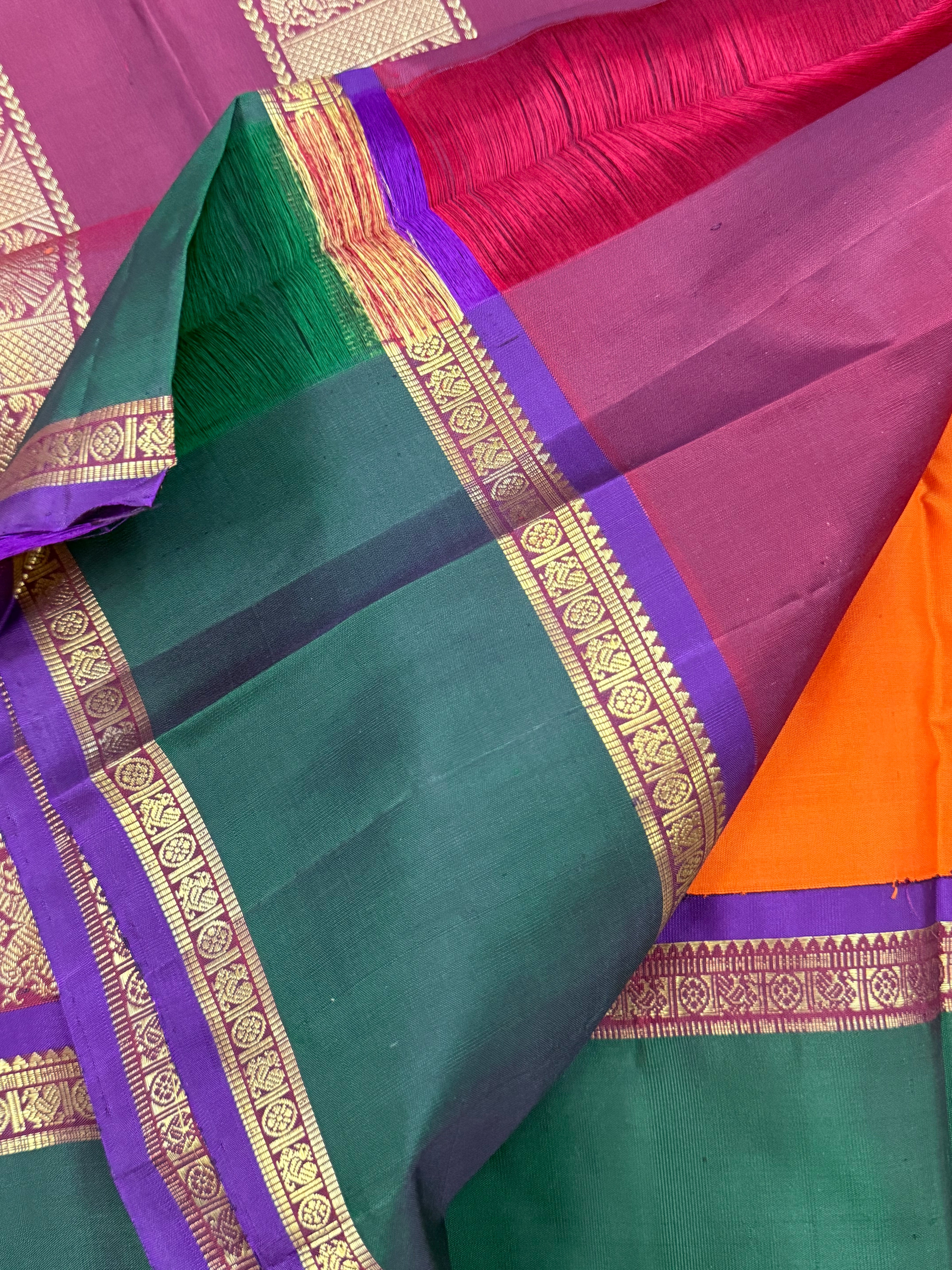 Orange and green border - Deep Araku pallu kai korvai/ Kanjipuram silk