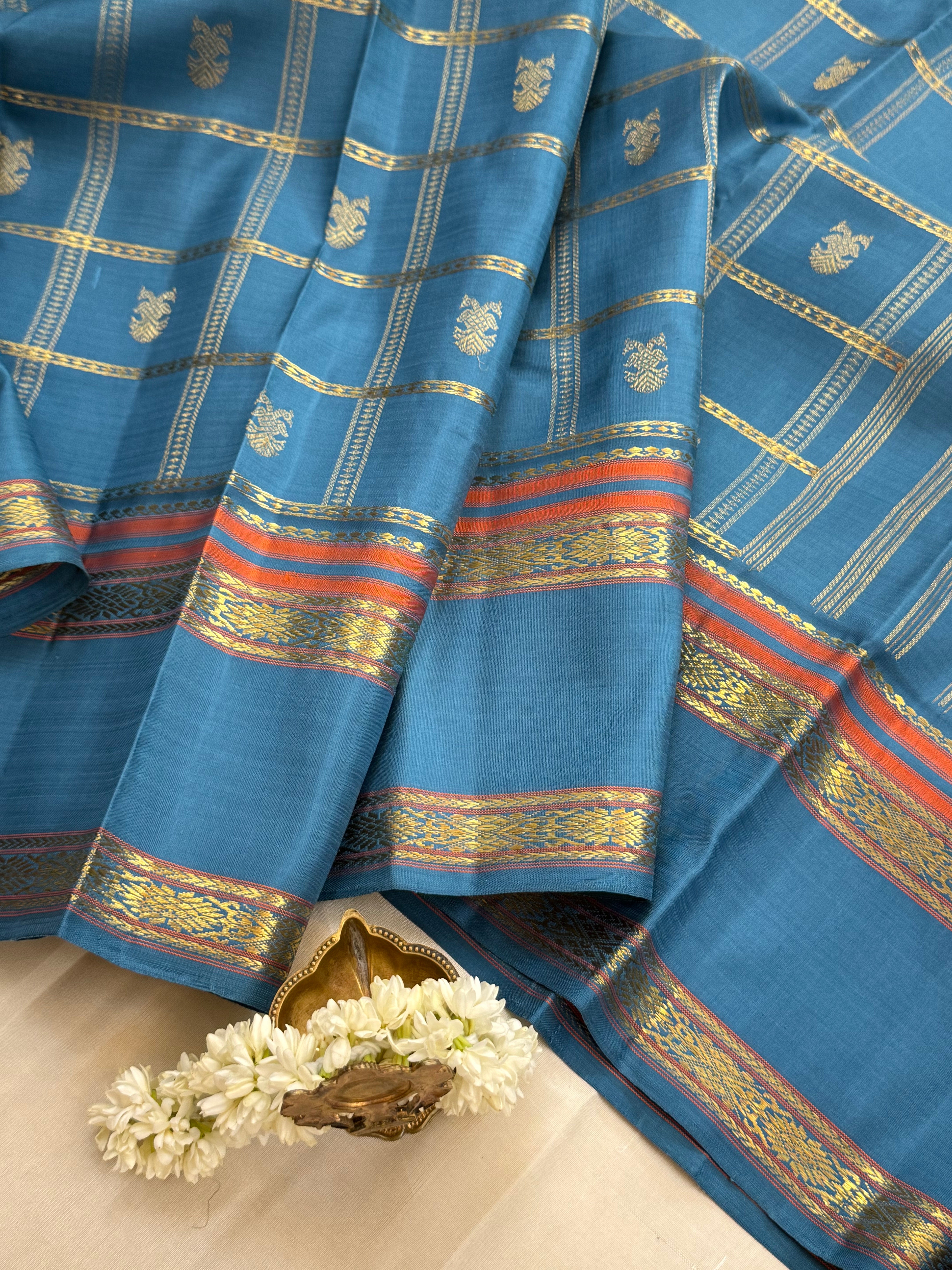 Master weaver Powder blue Kattam Butta Kanjipuram silk