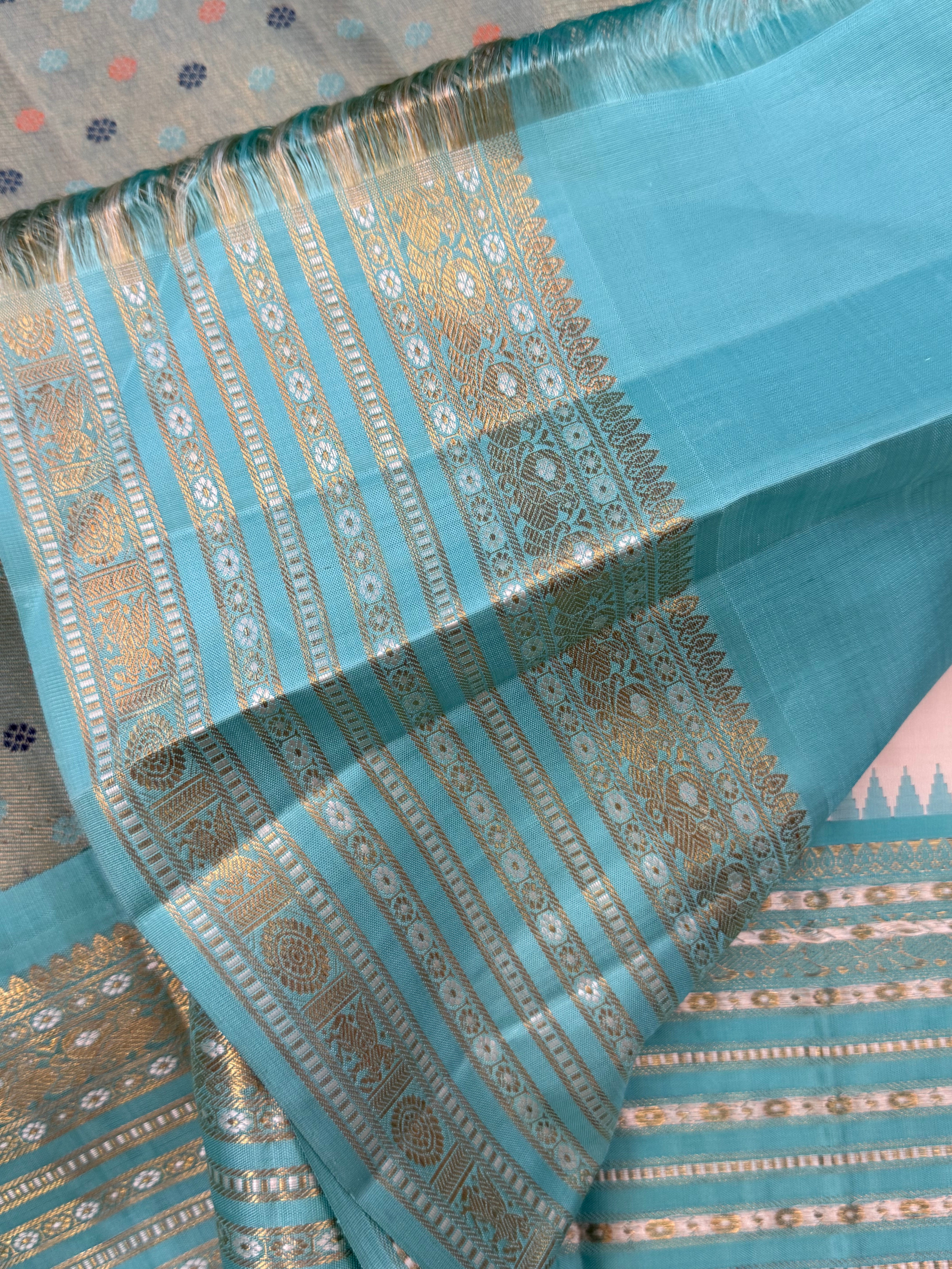 Off white with aqua blue Meenakari Butta with varisapet border Korvai / kanjipuram silk saree