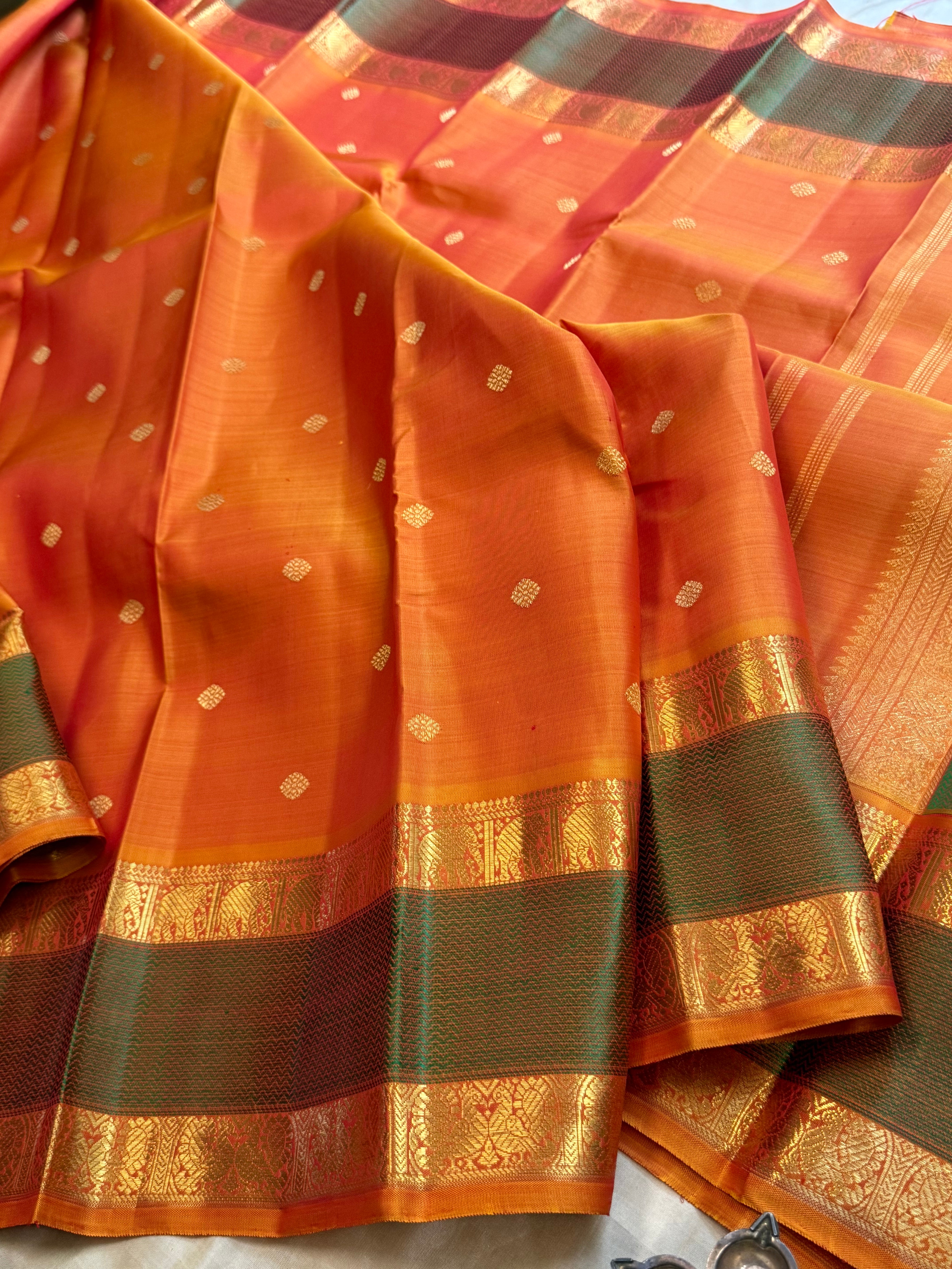 Orange rettapet border/ Kanjipuram silk