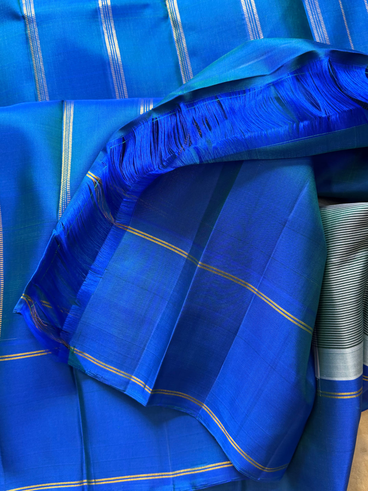 Striped Korvai blue border Arani silk saree