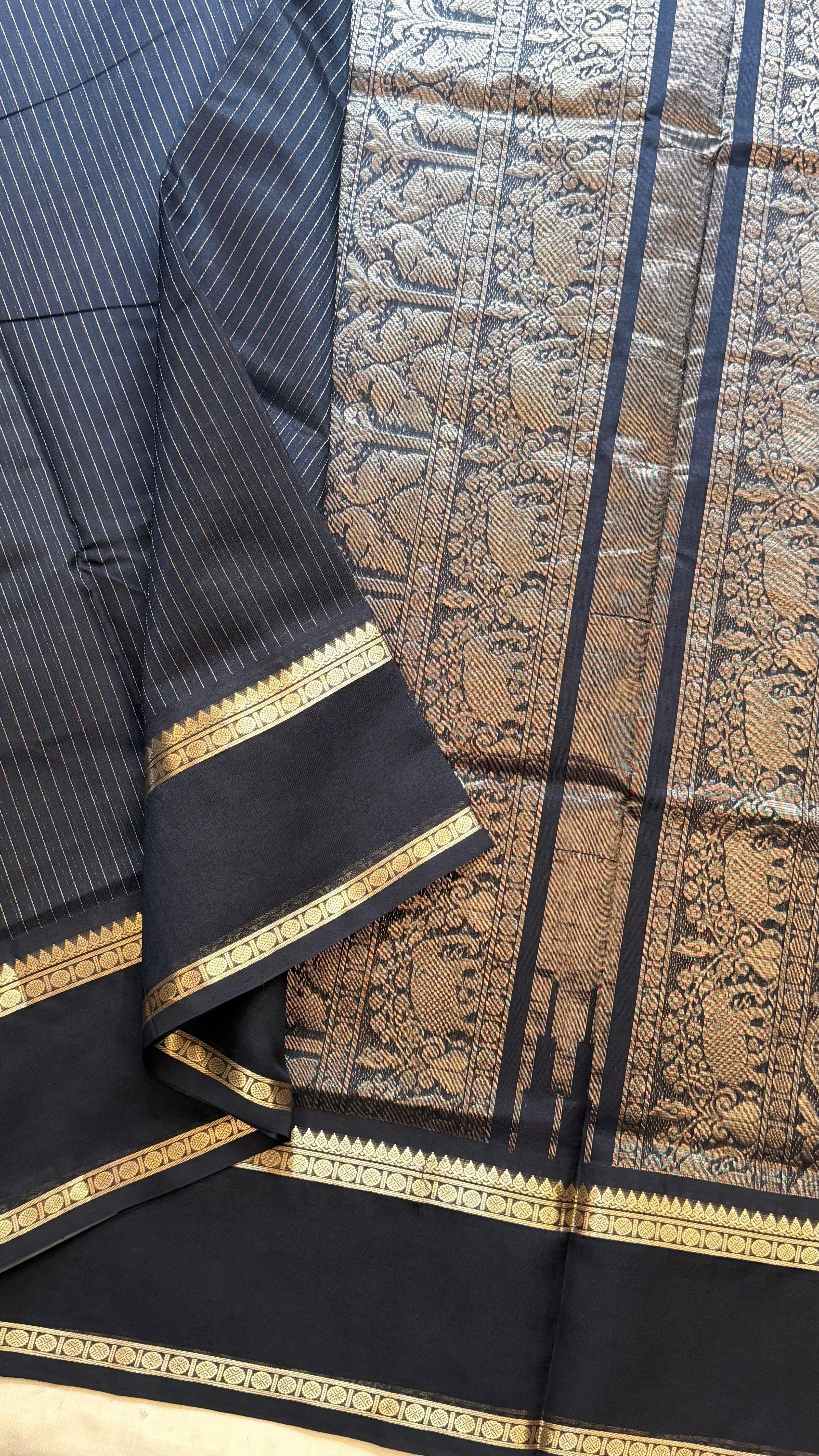 Muthu Oosi black silk cotton.