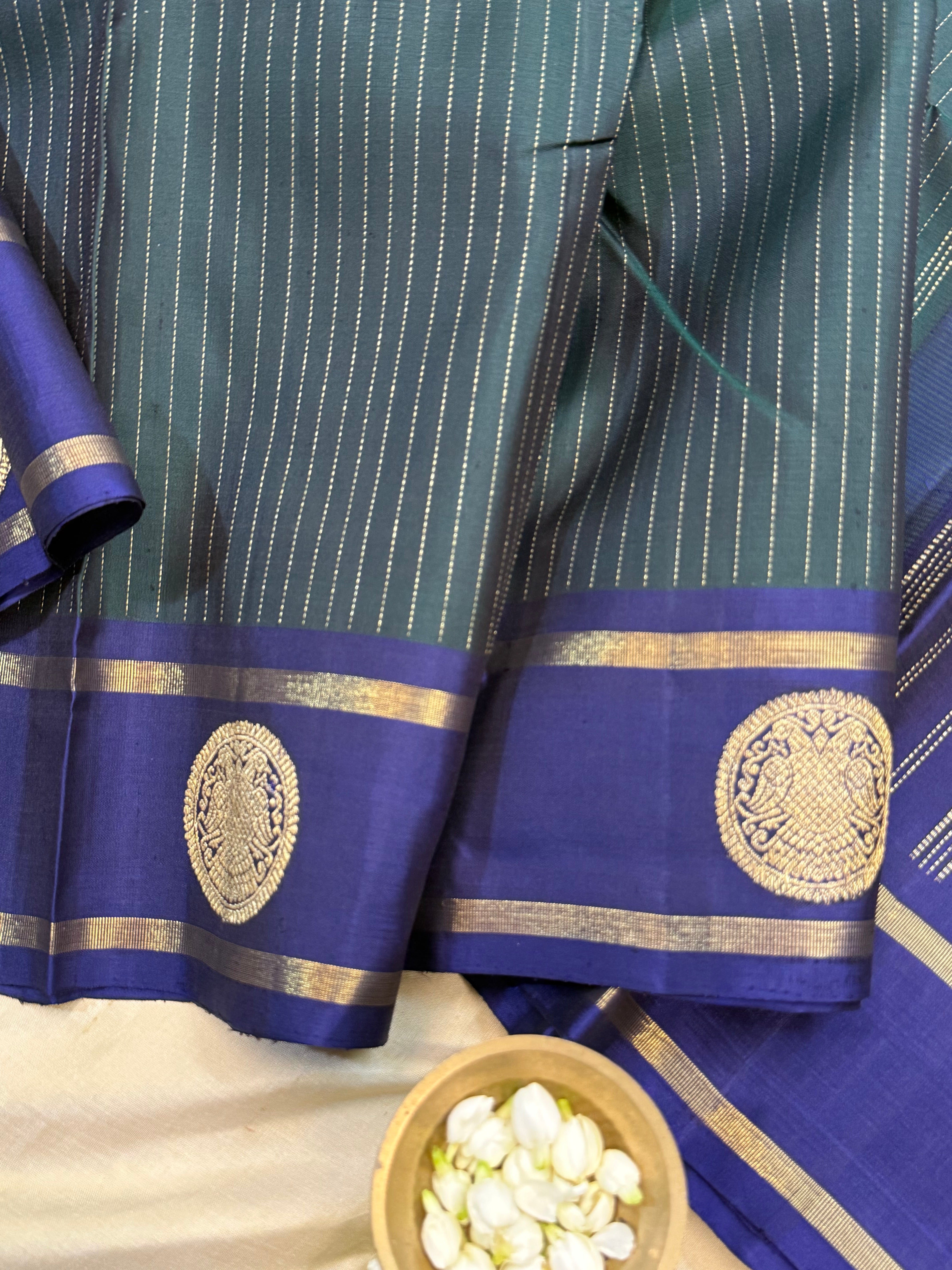 Dark green and violet oosi stripes border butta / Kanjipuram silk