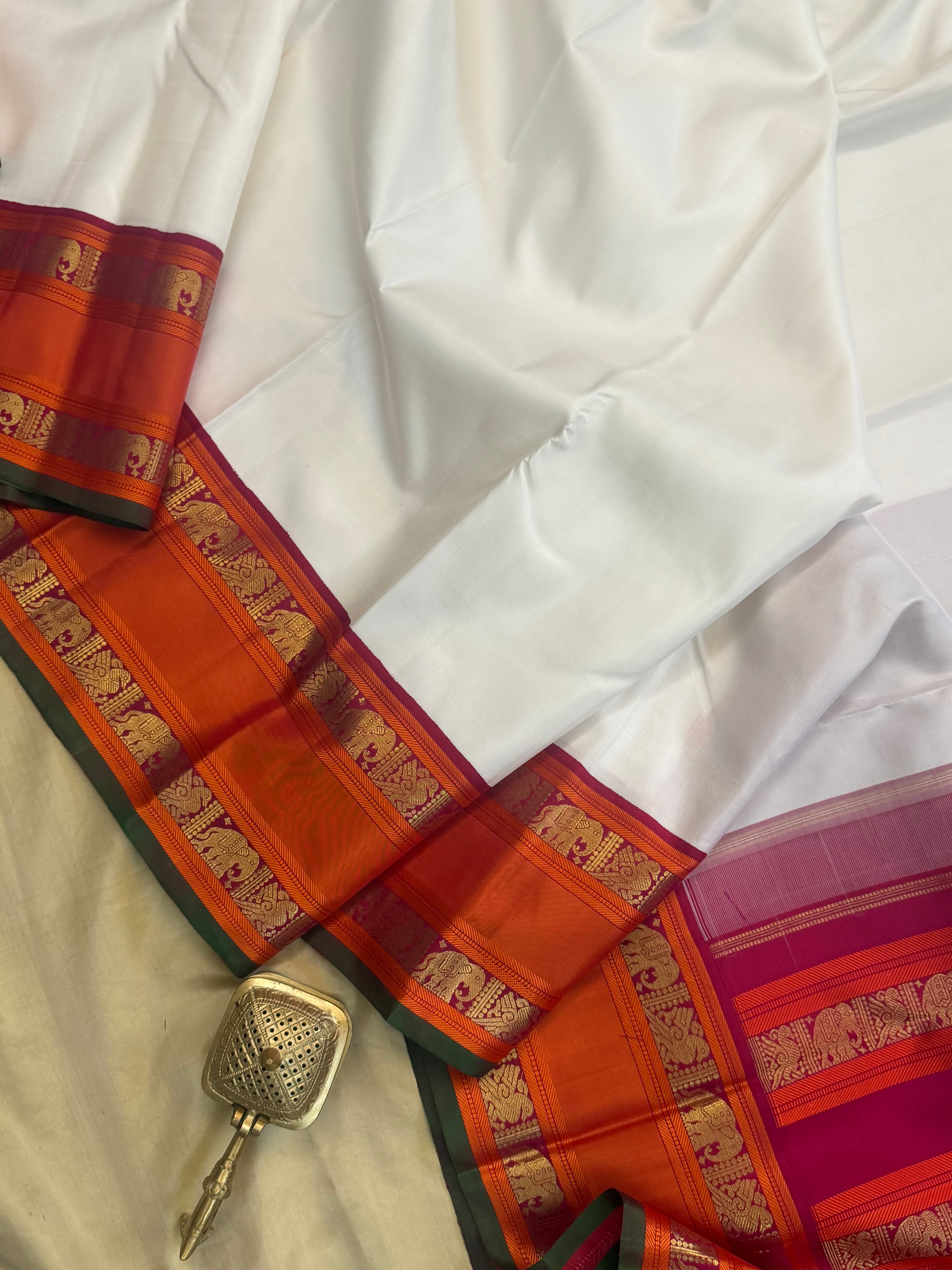 Onam collection: white kai Korvai / pure zari Kanjipuram silk