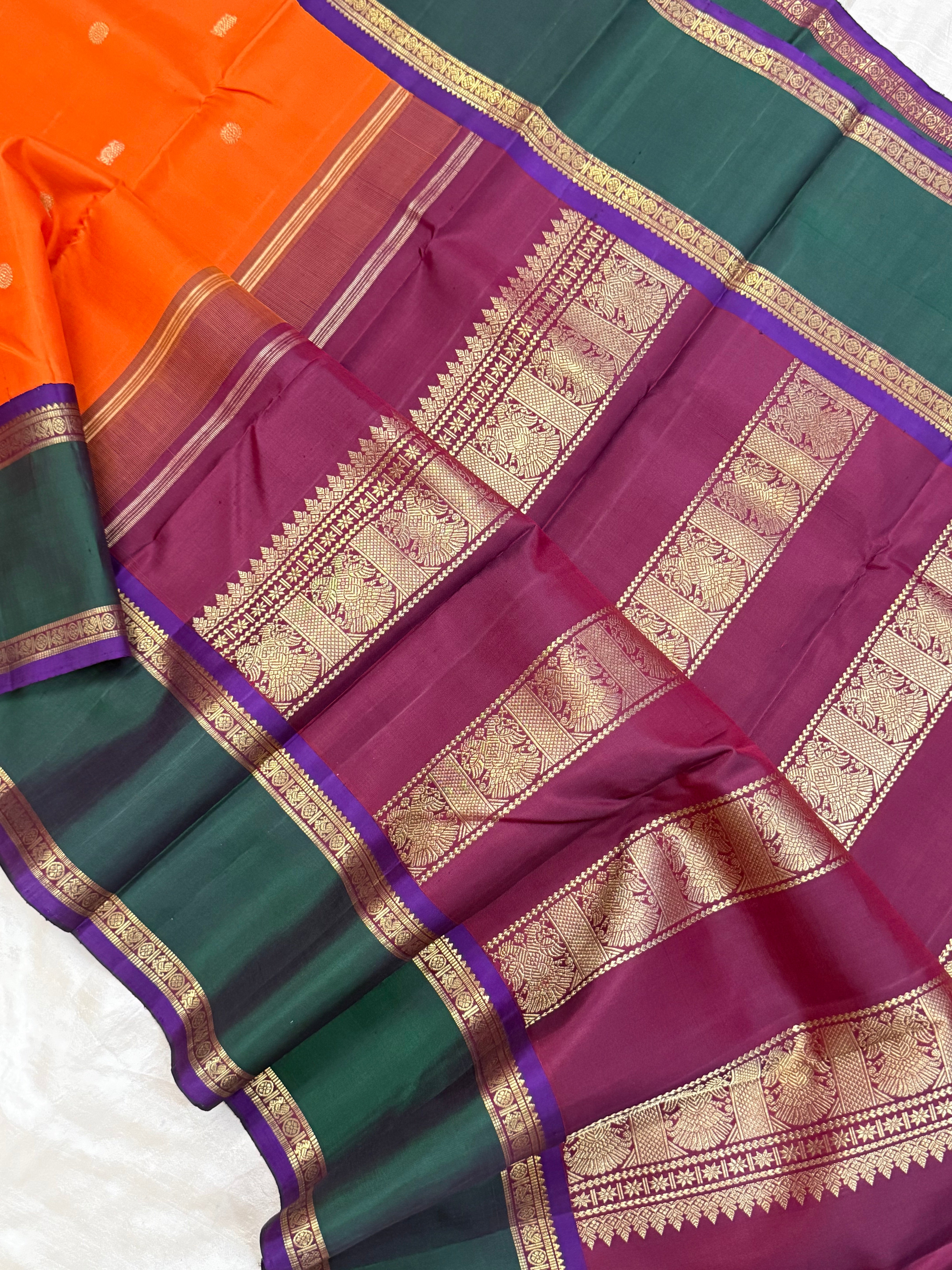 Orange and green border - Deep Araku pallu kai korvai/ Kanjipuram silk