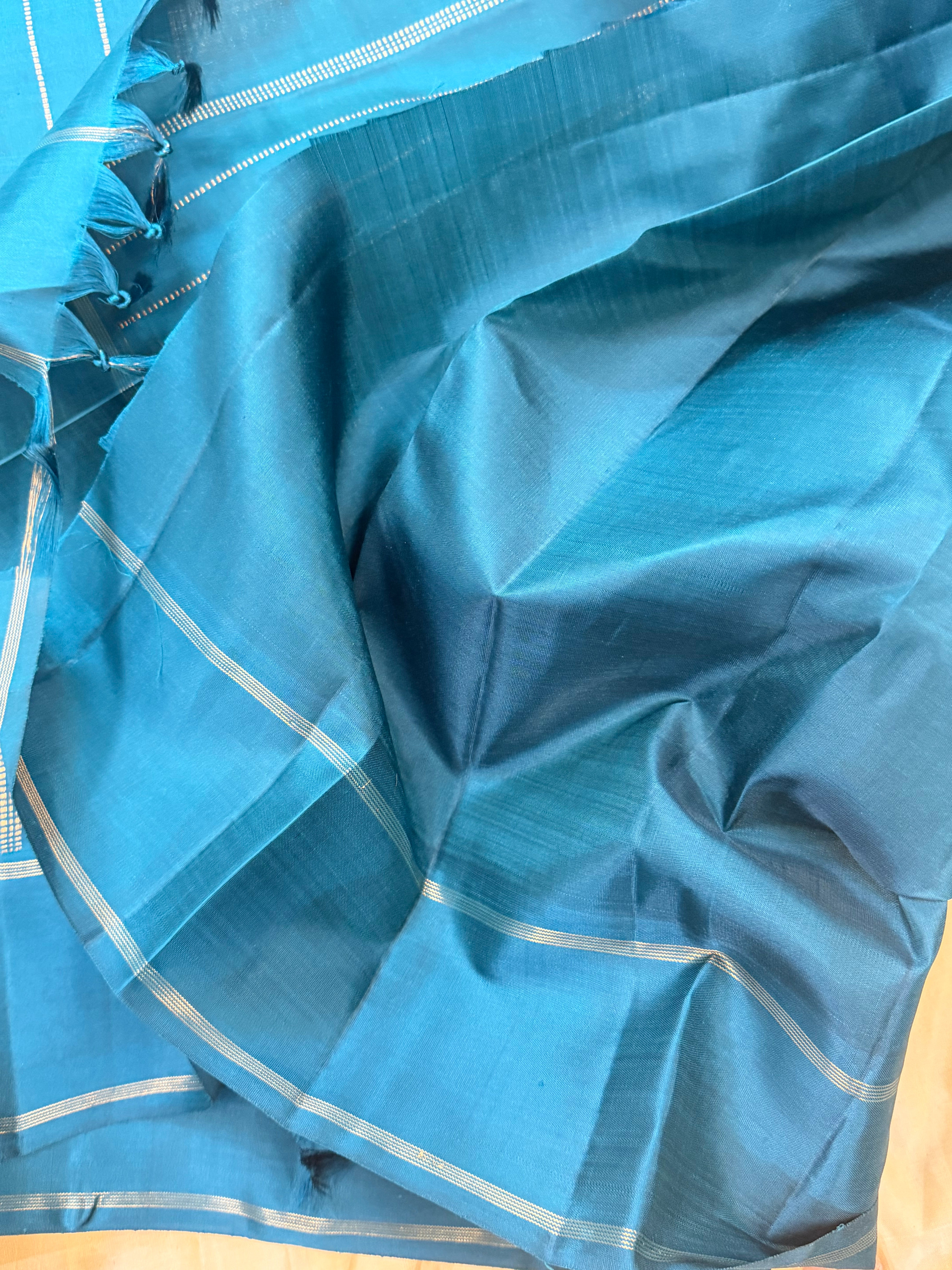 Teal blue 1000 Butta pure Zari Kanjipuram silk