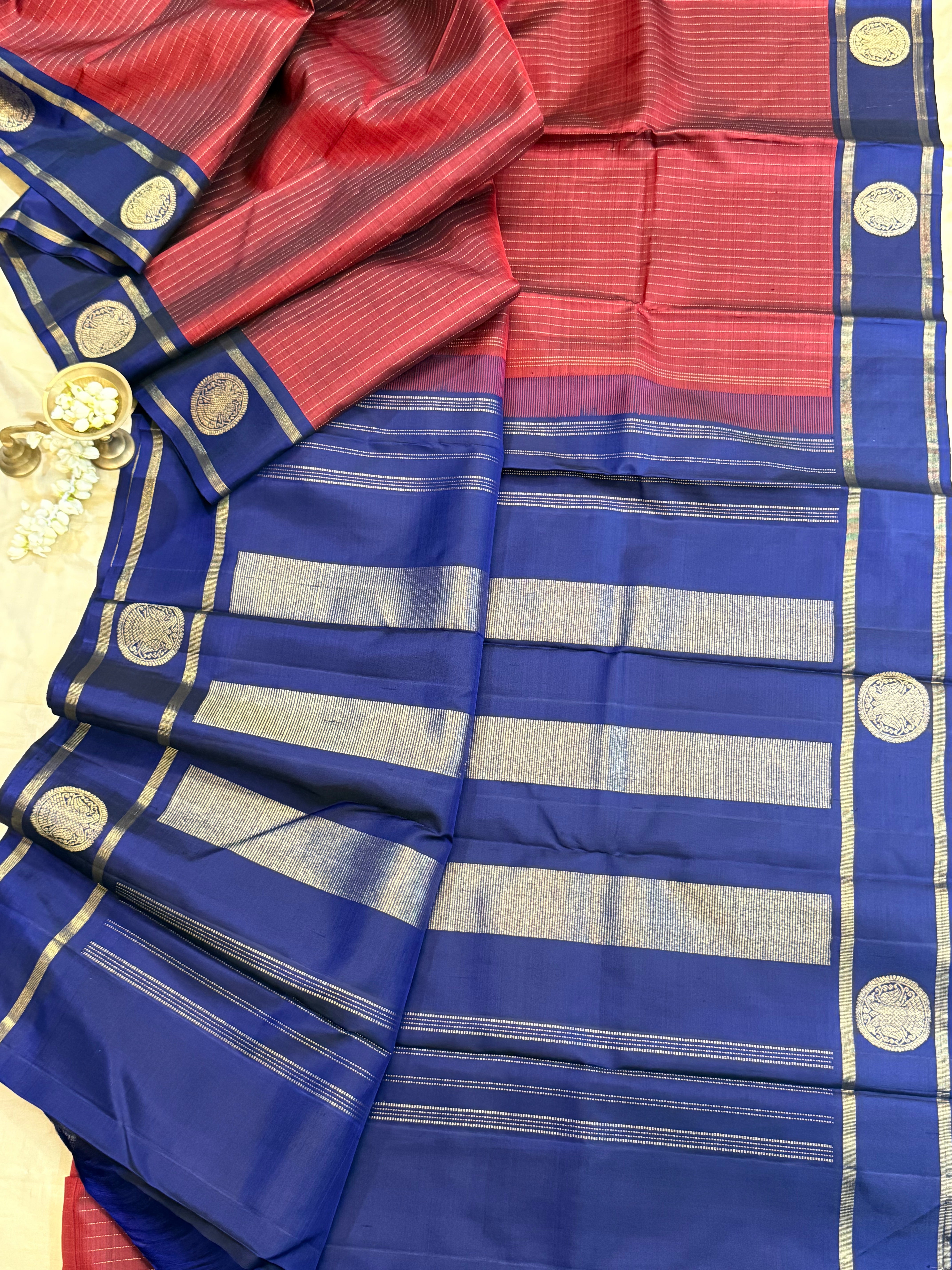 Rust and blue border butta/ Kanjipuram silk