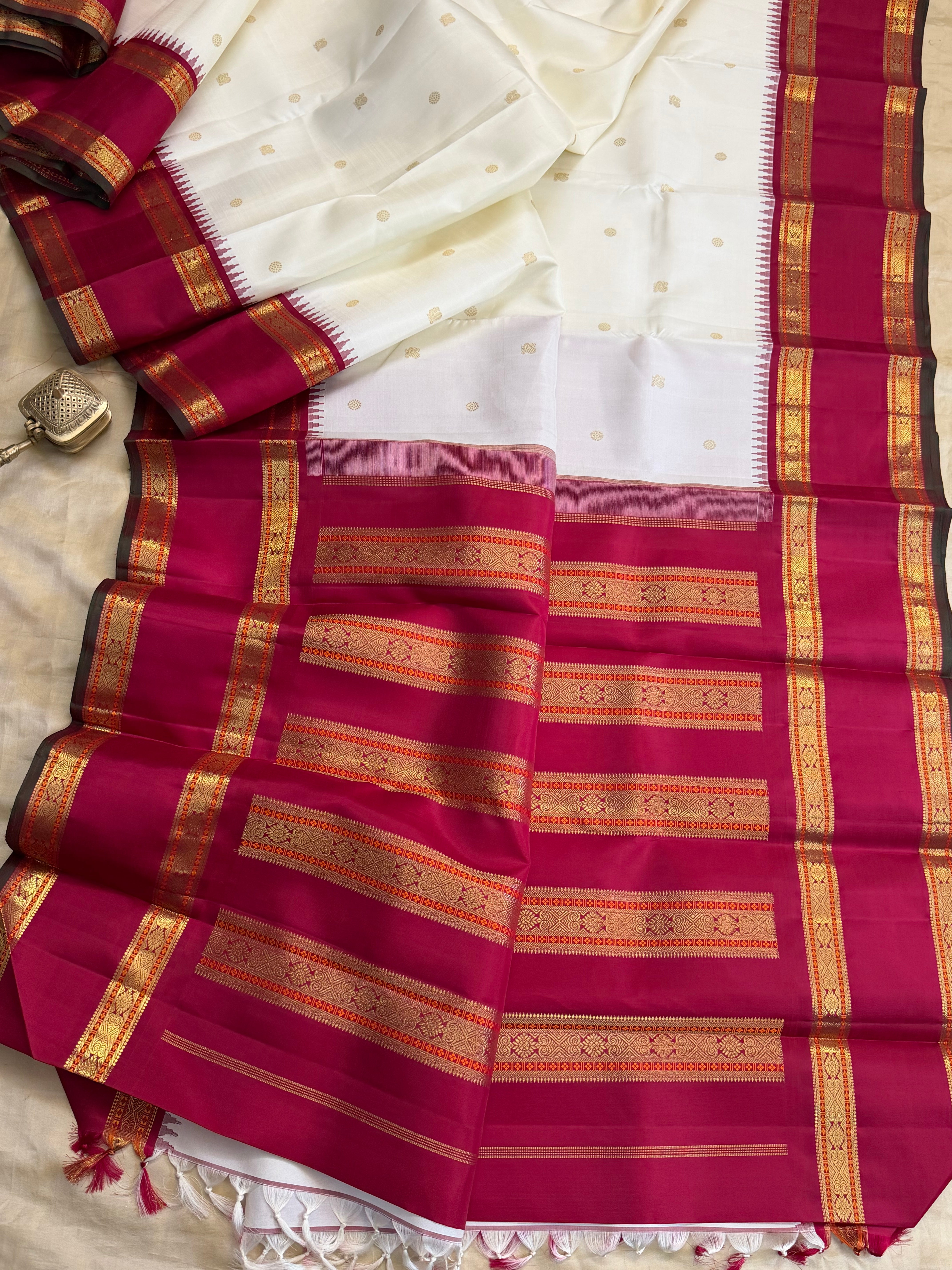 Onam collection: off white red retta pet Korvai / pure zari Kanjipuram silk