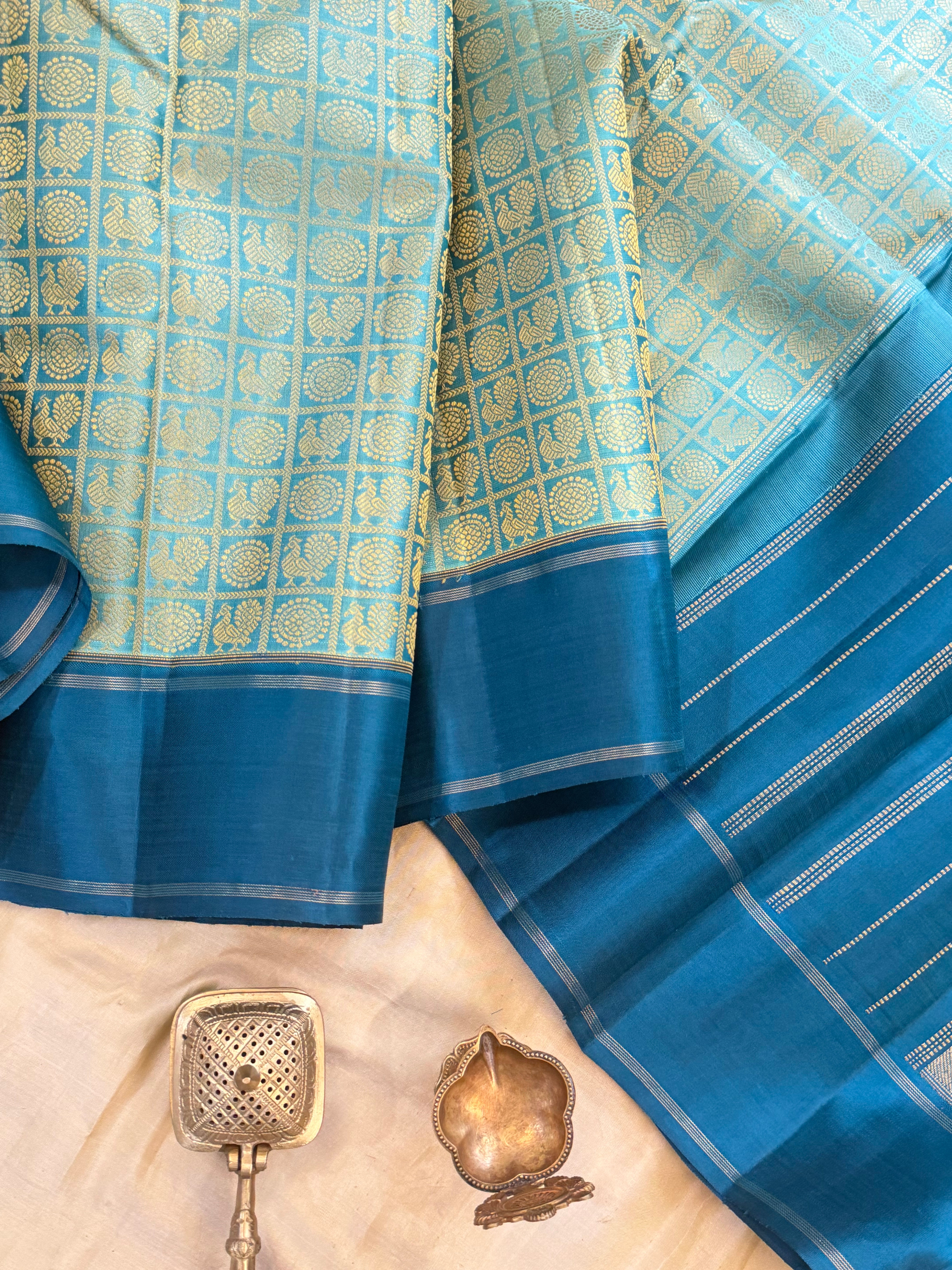 Teal blue 1000 Butta pure Zari Kanjipuram silk
