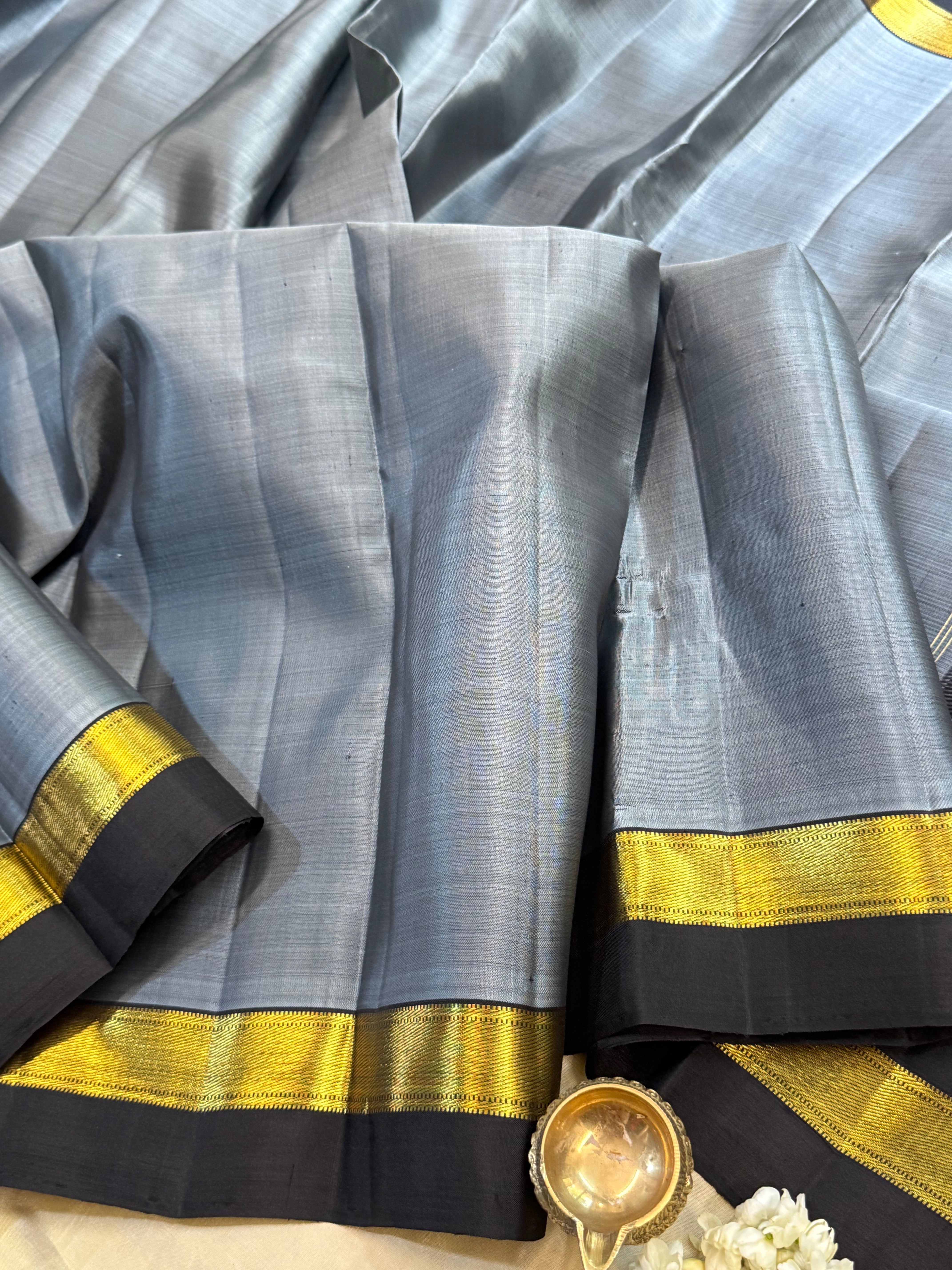 Bluish grey and black kaal erangina border/ Arani silk
