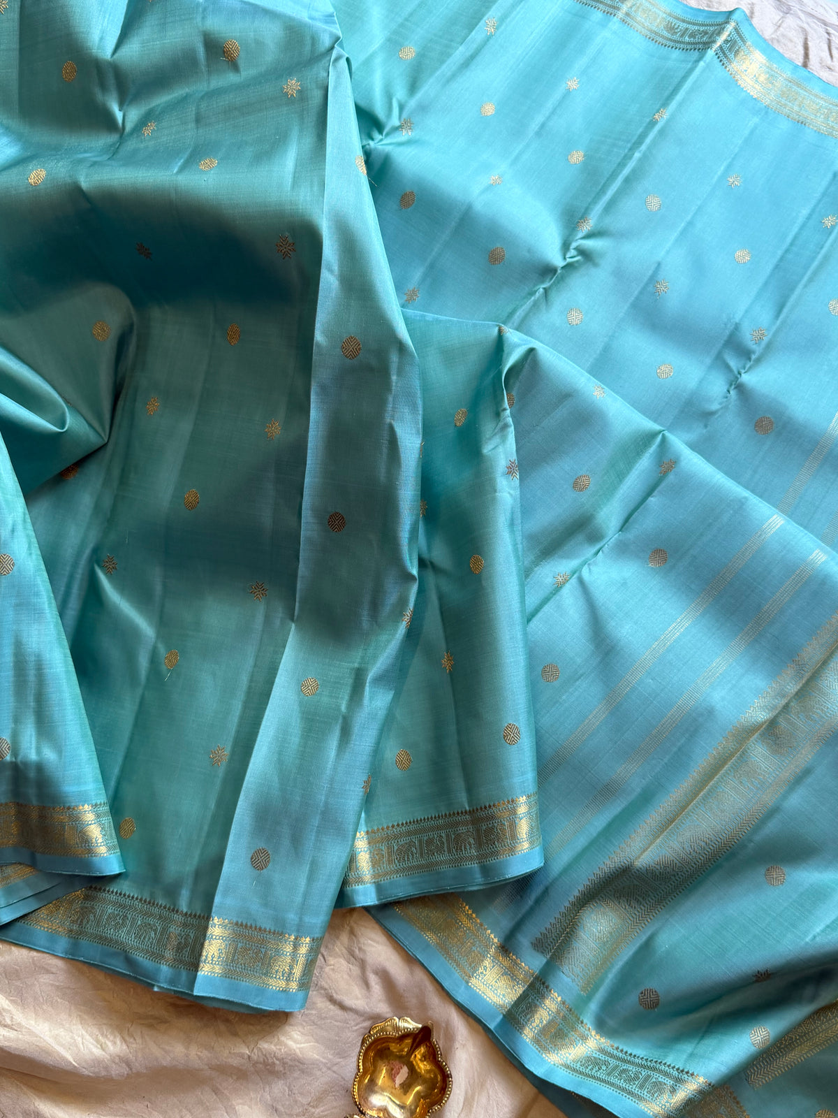 Pastel powder blue color pure Zari pencil border Kanjipuram