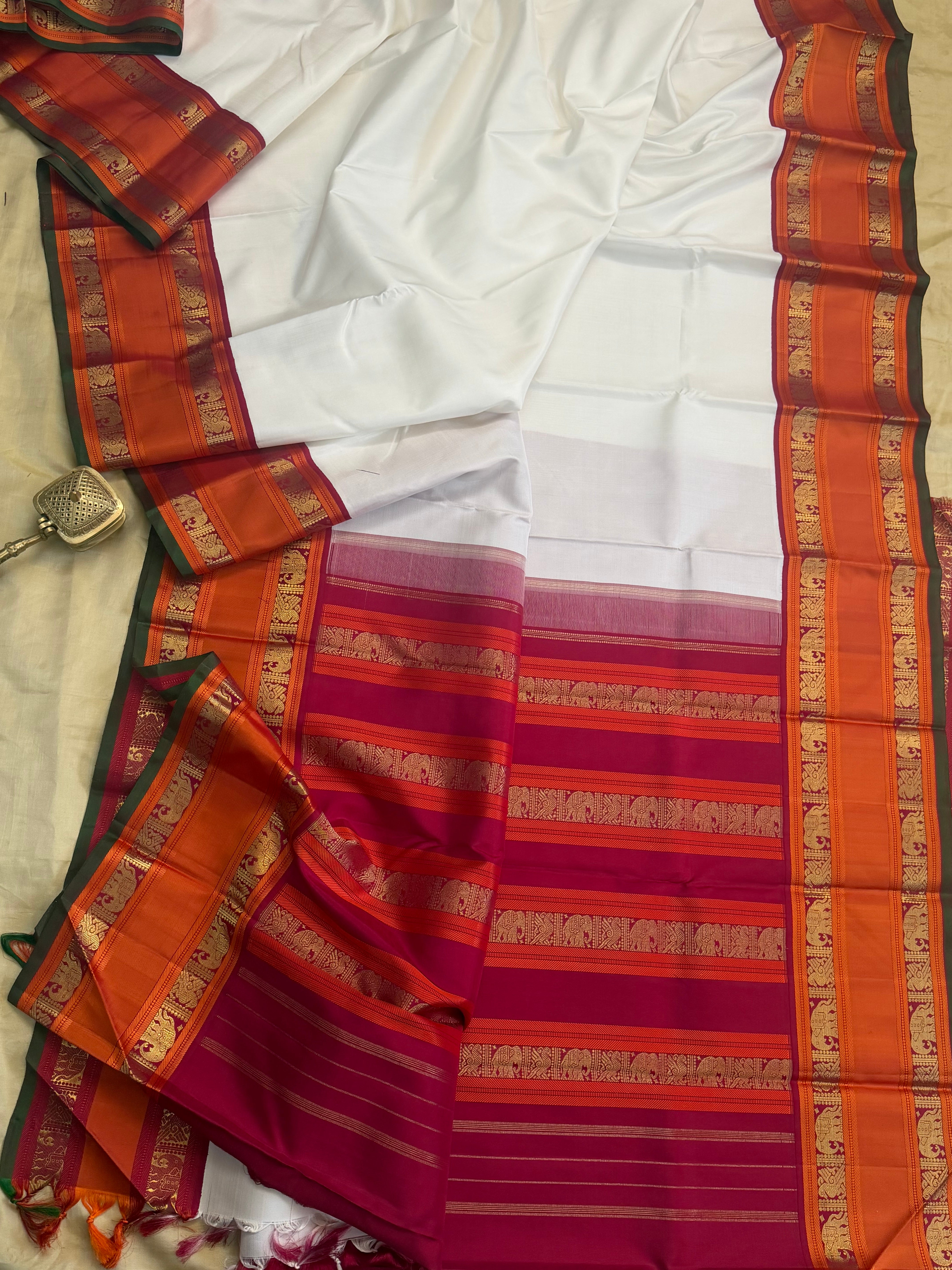 Onam collection: white kai Korvai / pure zari Kanjipuram silk