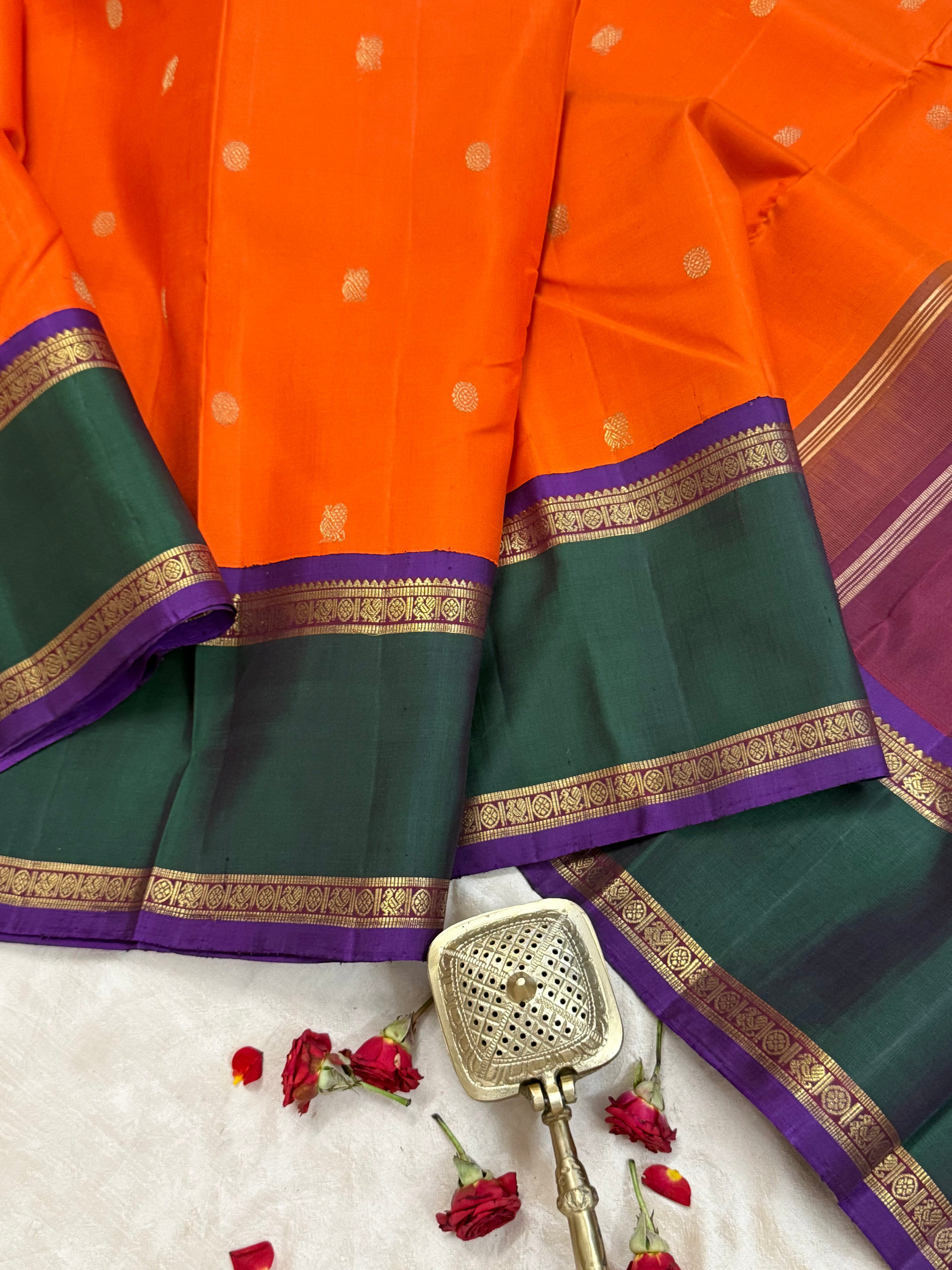 Orange and green border - Deep Araku pallu kai korvai/ Kanjipuram silk