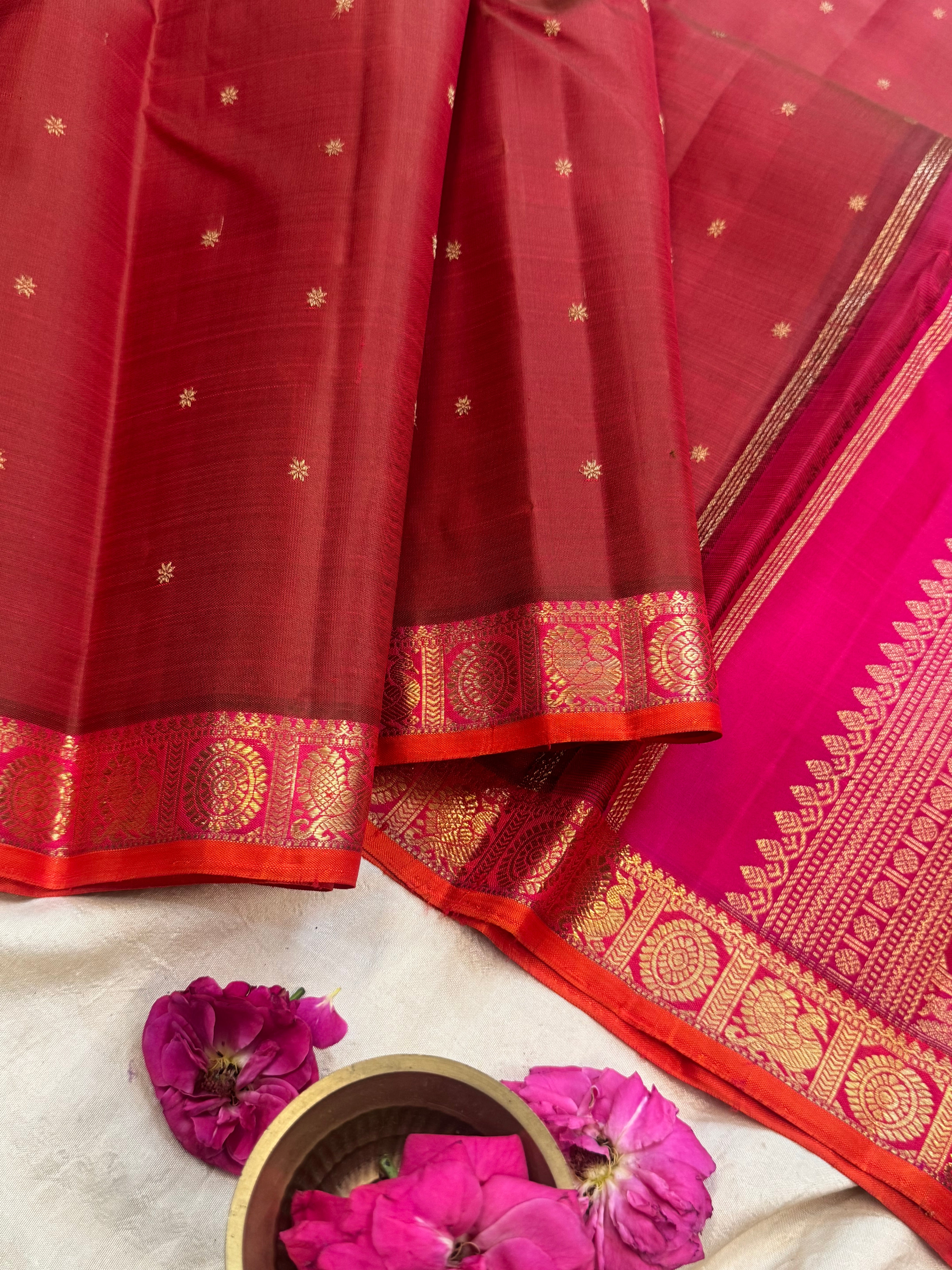 Manthulir pink border small border kanjipuram silk