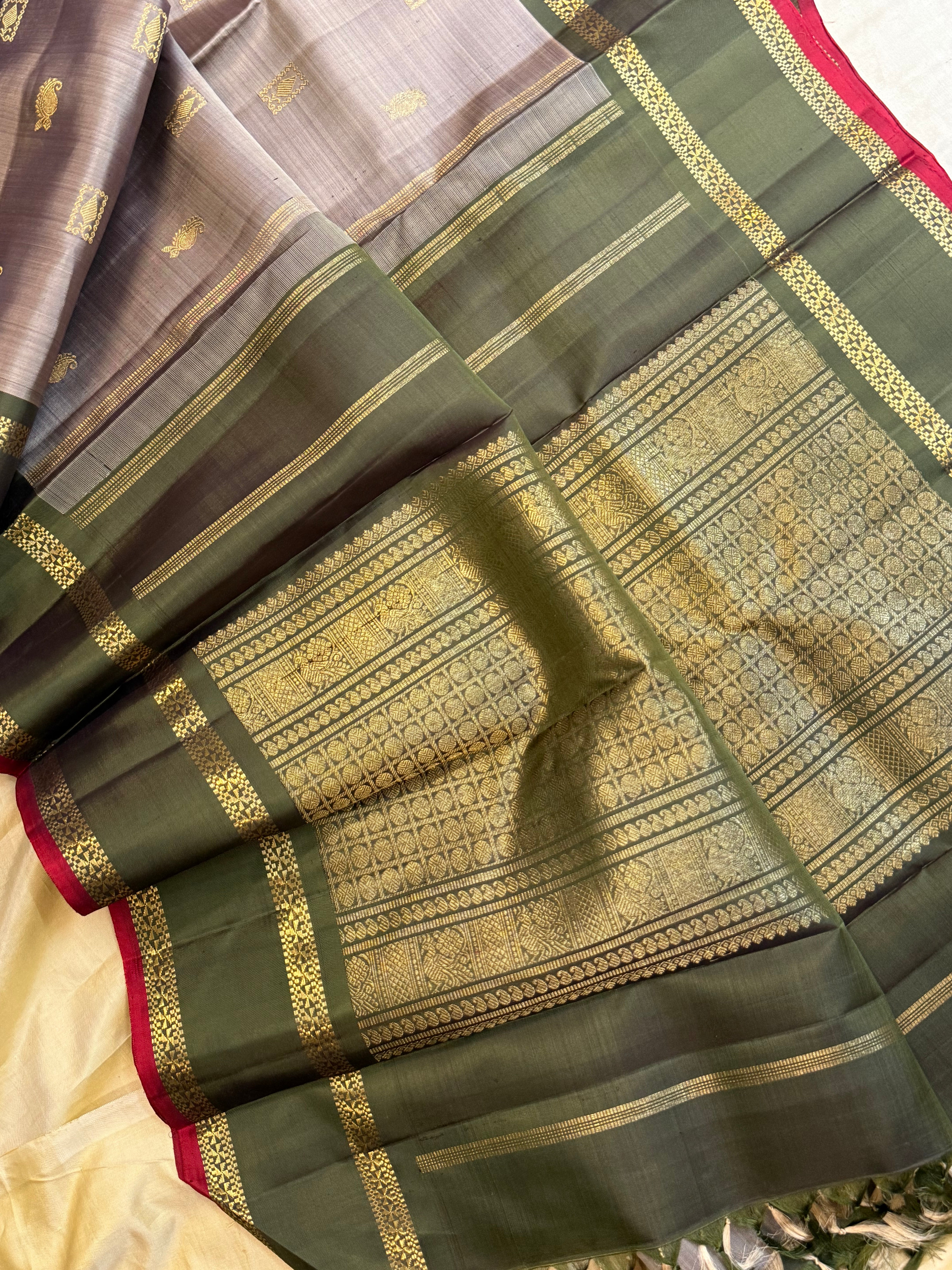 Greyish green unique butta / Kanjipuram silk